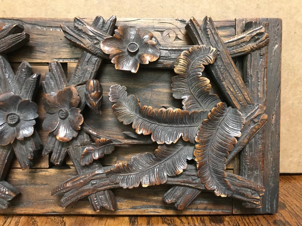A beautifully carved and well made portable and expandable traveling book shelf. Made to be placed on a table or desk and hold a small library of books, can expand outward to accommodate additional volumes. Carved of walnut by a master craftsman.