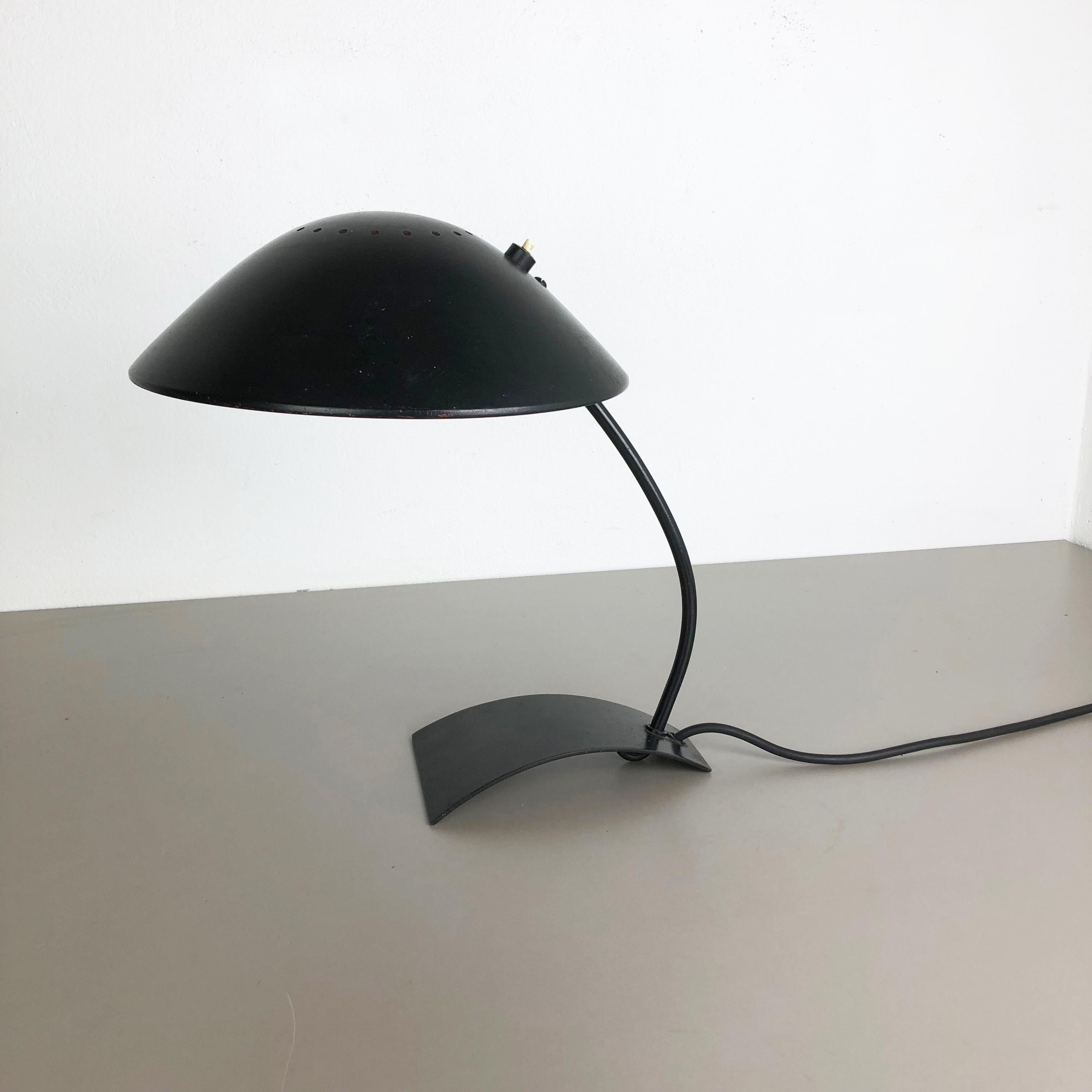 Article:

Desk light model: 6840


Producer:

Kaiser Idell, Germany


Design:

Christian Dell (Bauhaus)


Age:

1950s


Original 1950s Kaiser Idell Bauhaus Light, designed by Christian Dell in the 1930s. All original good and
