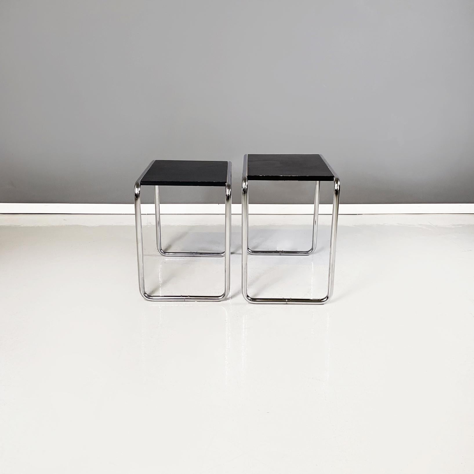 German modern Black wood and steel Coffee tables by Arnold Bauhaus Collection, 1980s
Pair of coffee tables that can be nested one inside the other. The rectangular top of the table is in black painted wood. The structure is in tubular