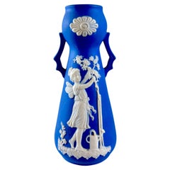 German Blue Jasperware Winged Fairy Bud Vase