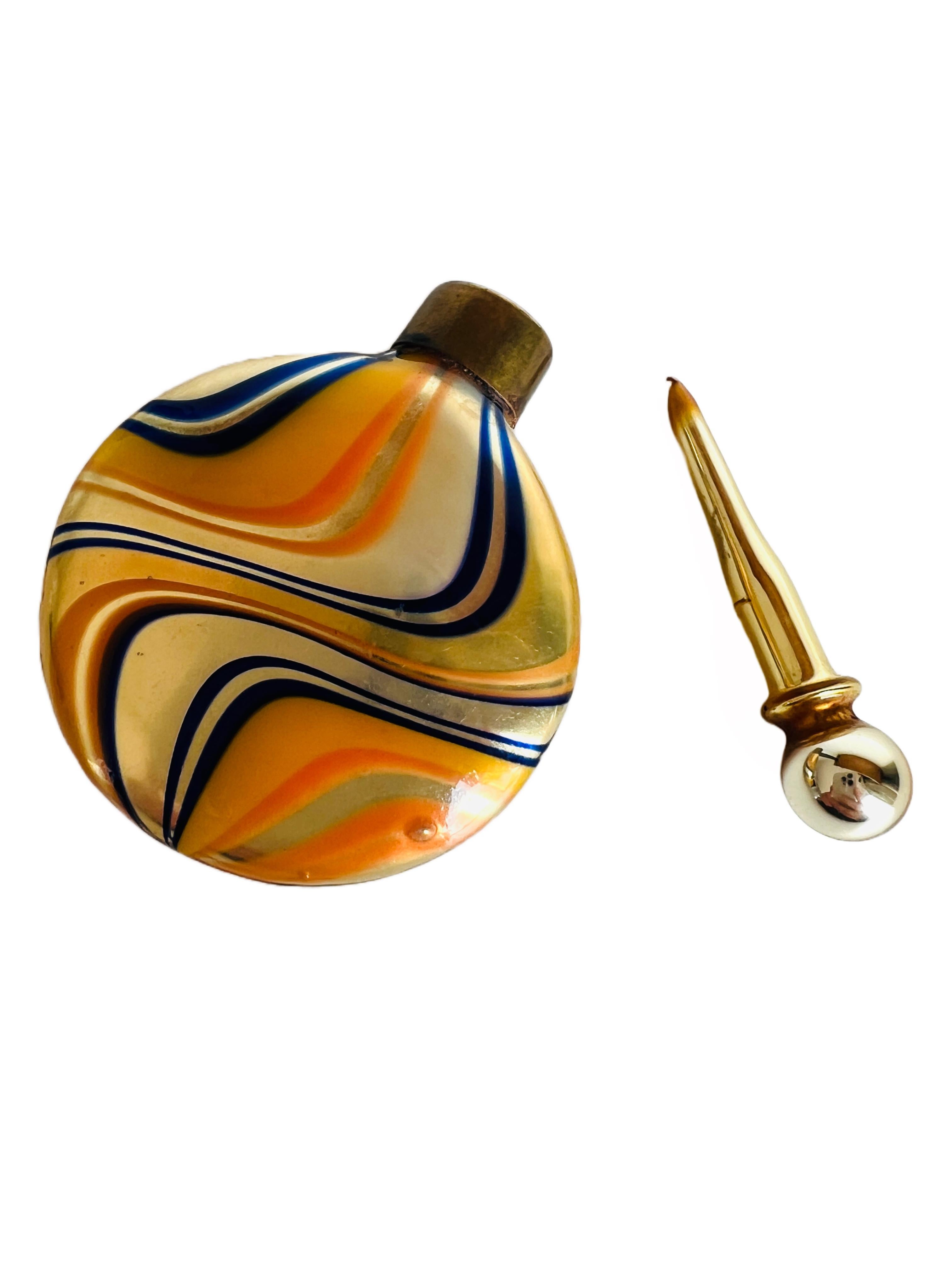 Lovely orange and blue swirled mercury blown glass perfume bottle with delicate dauber.

Size:  2-1/8