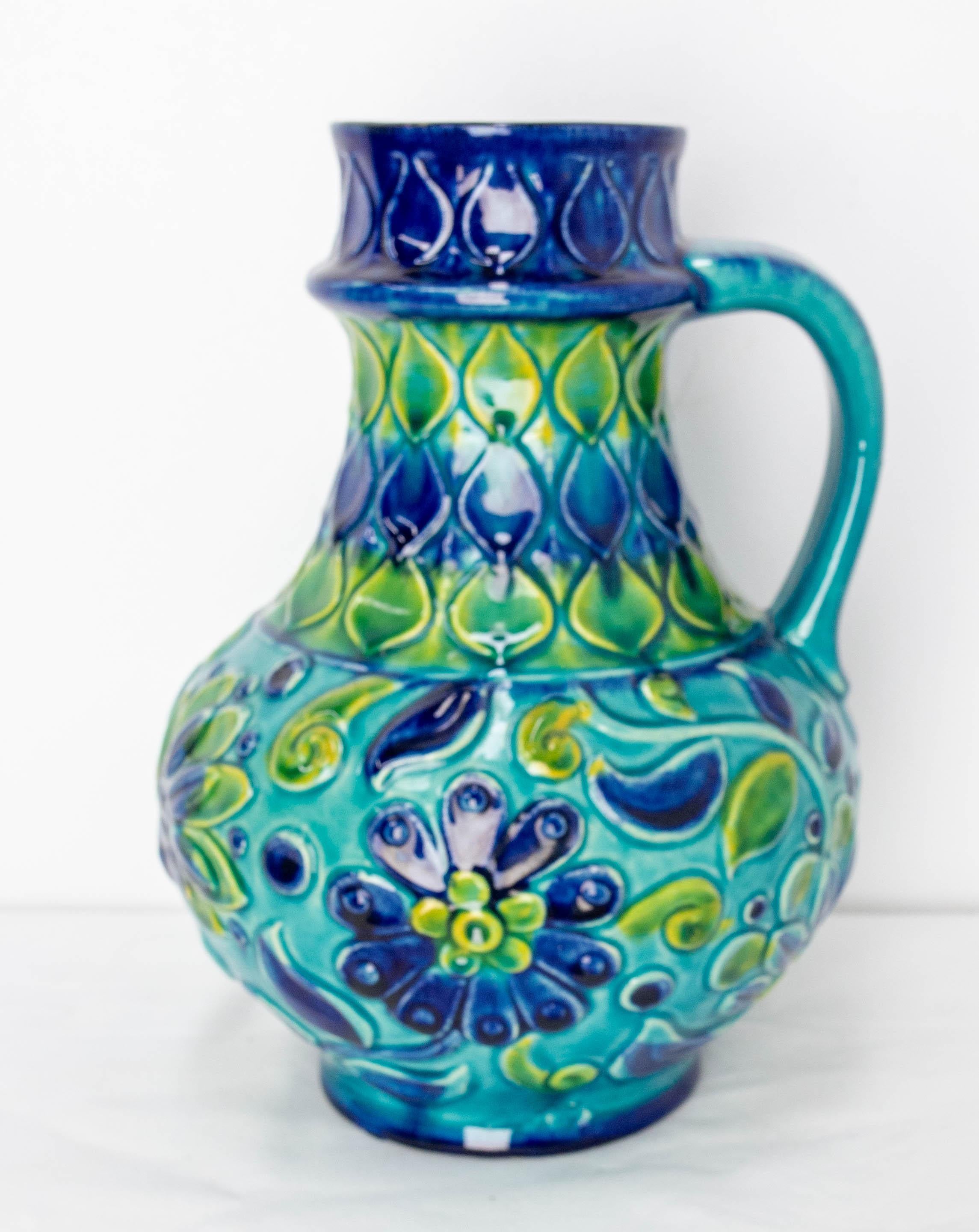 Blue and green pitcher in galzed ceramic from the factory Bay Keramik 8730 Model
Made circa 1950-1960
West-Germany, after the Second Word War, it took a few years to rebuild the German pottery industry. At its height, from the 1950s to the 1970s,