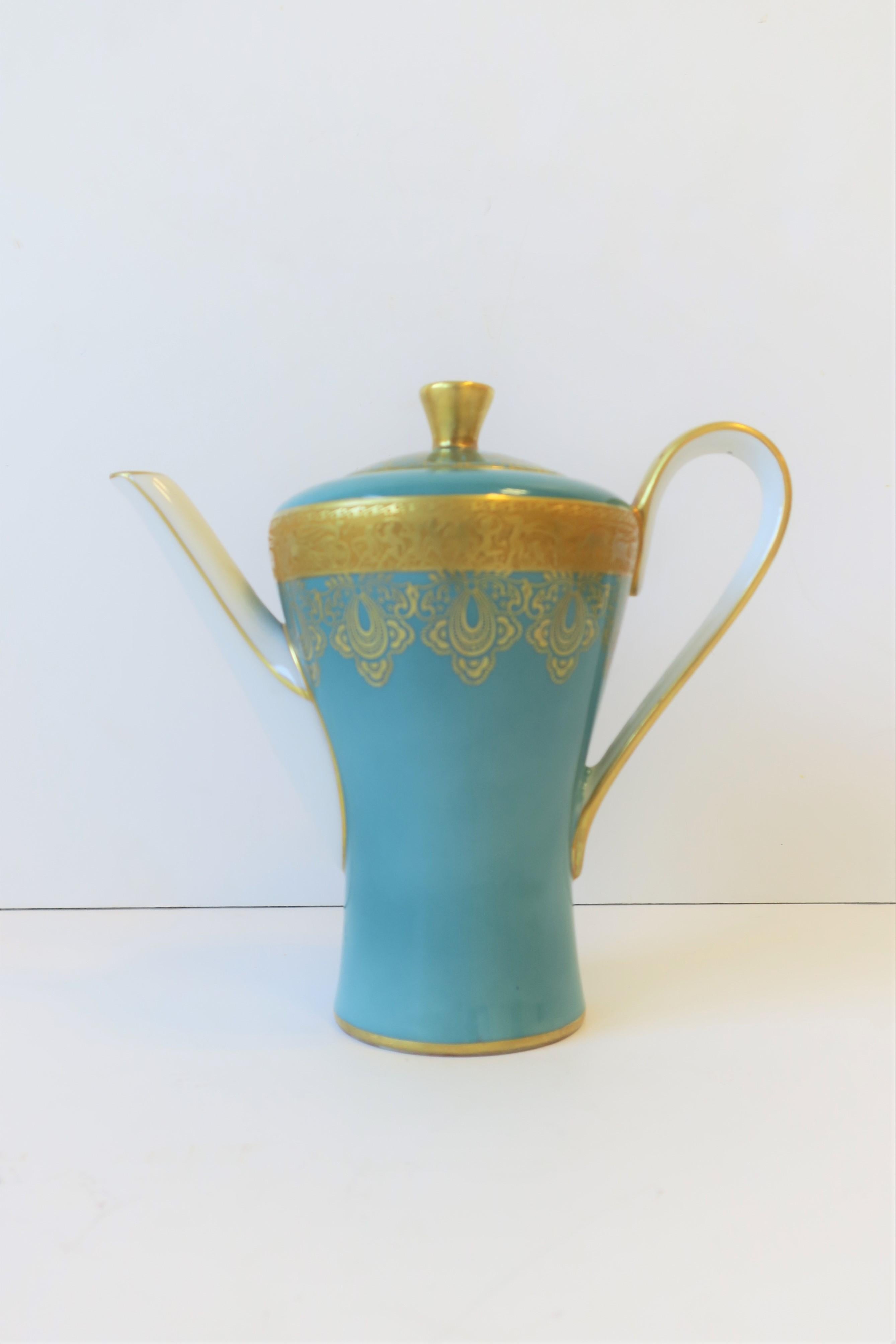 white and gold coffee pot