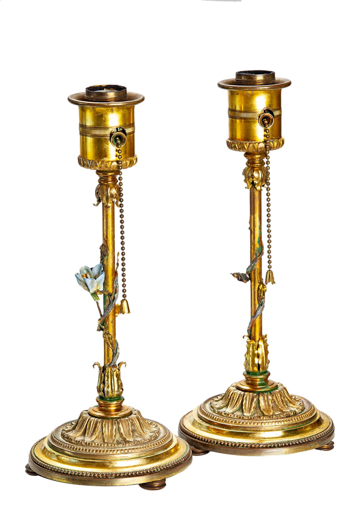 Precious bedside or vanity lamps with pull-chain & standard sized sockets.
Vine with tiny leaves & a bud wrap around the brass stem. Very heavy ornate footed bases. 
New Restoration Hardware clip on shades are available upon request.