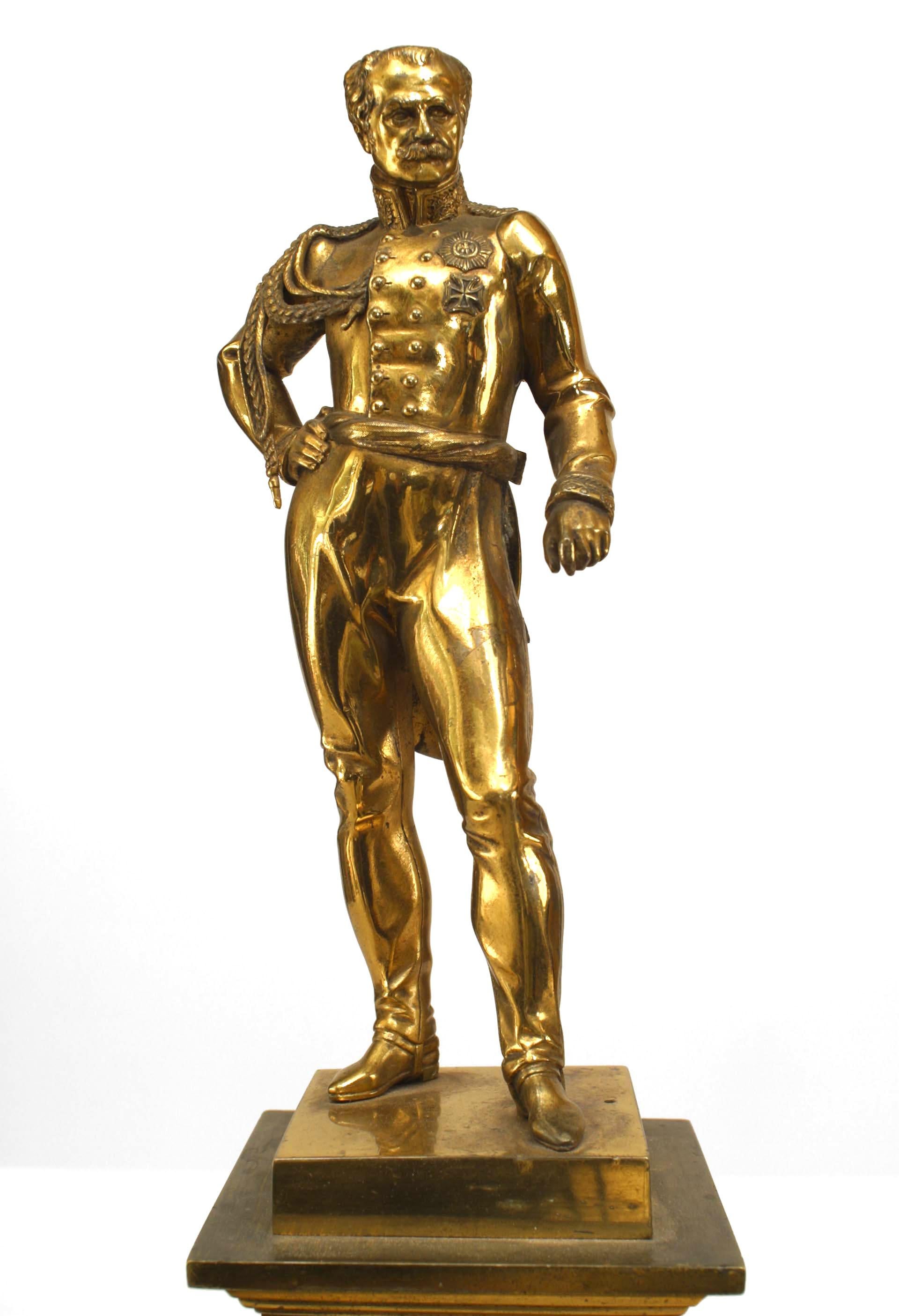 German brass figure of General Bruchner standing with hand on hip on square shaped pedestal base (19th Cent)
