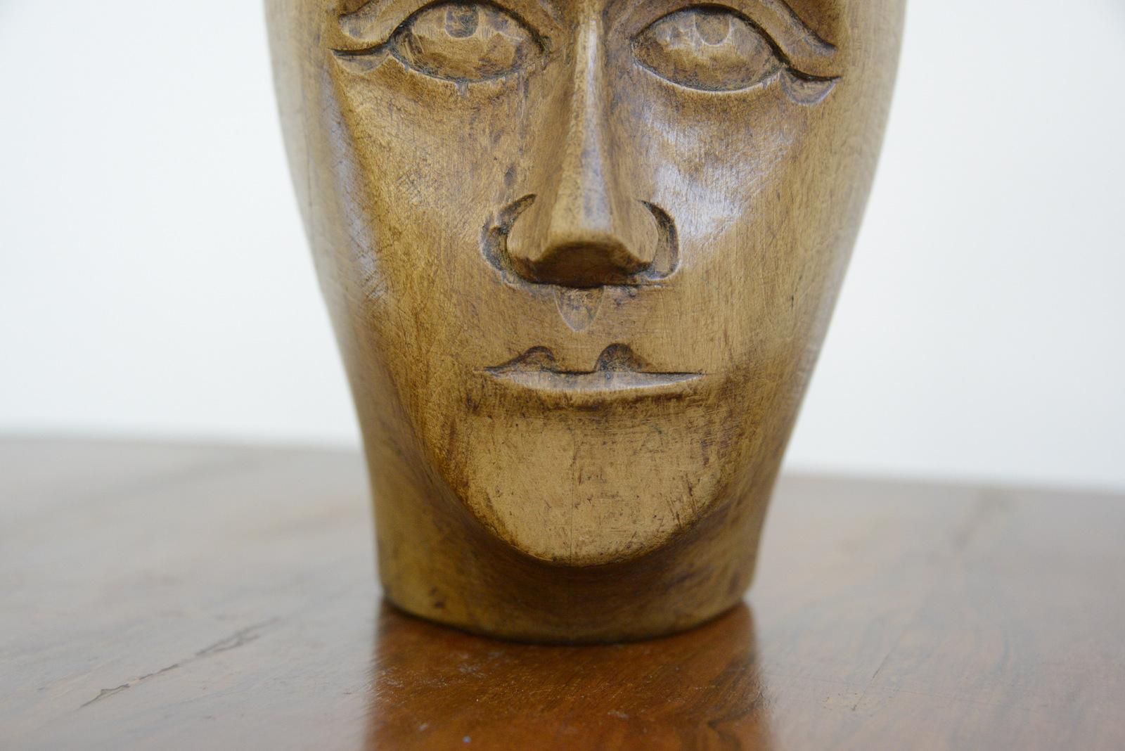 German carved wooden milliners head circa 1910

- Hand carved from sycamore
- Used in the displaying and making of hats
- German ~ 1910
- Measures: 25cm tall x 15cm wide x 18cm deep

Condition report

Signs of its previous in the form of