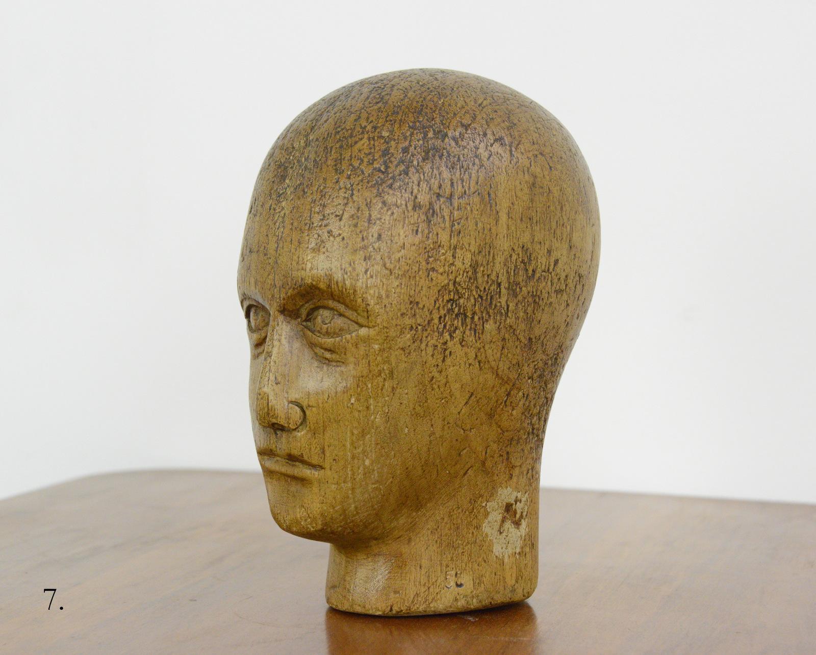 German carved wooden Milliners Head, circa 1920

- Hand carved from sycamore
- Used in the displaying and making of hats
- German ~ 1920
- Measures: 25cm tall x 15cm wide x 18cm deep

Condition report

Signs of its previous in the form of