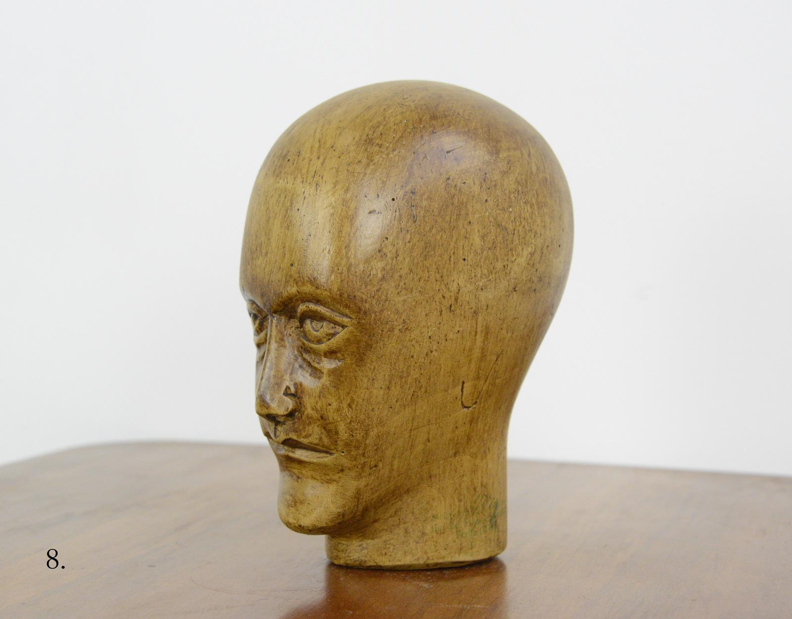 German carved wooden milliners head, circa 1920

- Hand carved from sycamore
- Used in the displaying and making of hats
- German ~ 1920
- 25cm tall x 15cm wide x 18cm deep

Condition report

Signs of its previous in the form of pin holes.