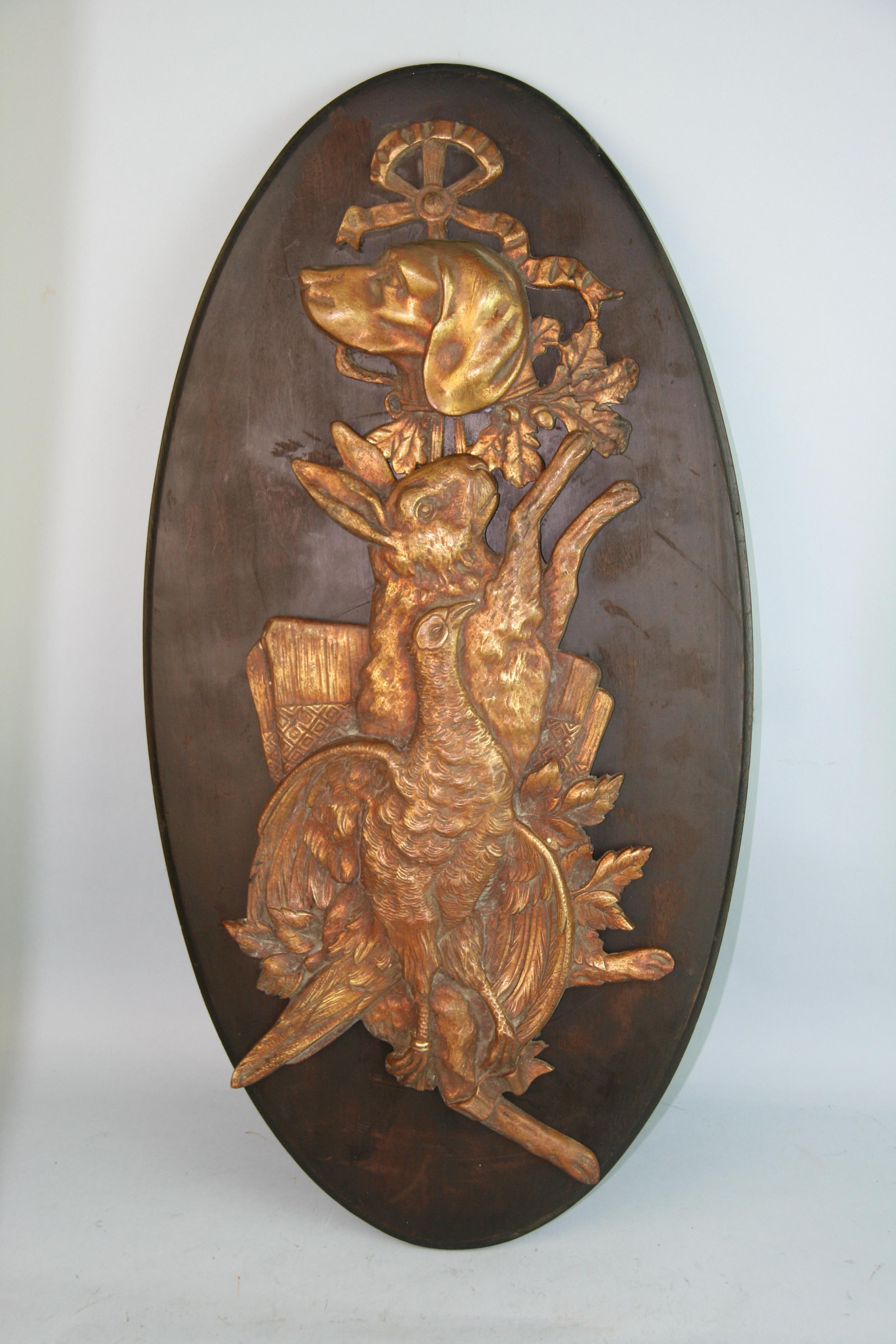 1221 Cast bronze German hunting plaque mounted on an ebonized walnut wood mounting board.