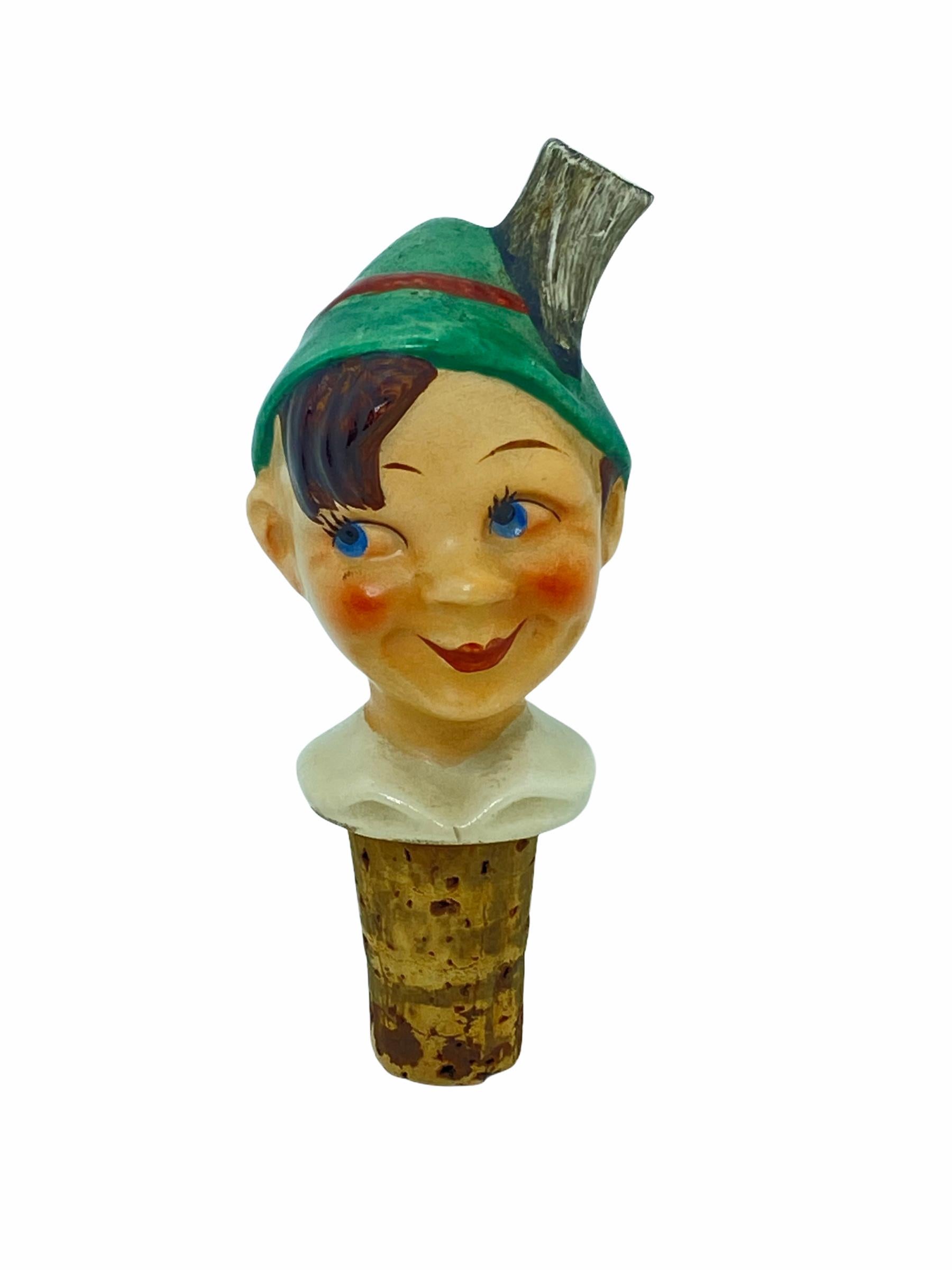 Adorable ceramic cork pourer or bottle stopper. It depicts a cheerful and beautifully painted boy with a small green hat, Germany, 1930s. Ideal decoration - pourer or bottle stopper. Great idea to surprise your guests or a very interesting gift.