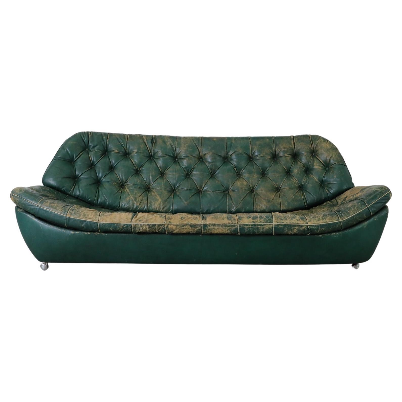 German Chesterfield Style Mid-Century Green Leather Tufted Sofa on Front Wheels For Sale
