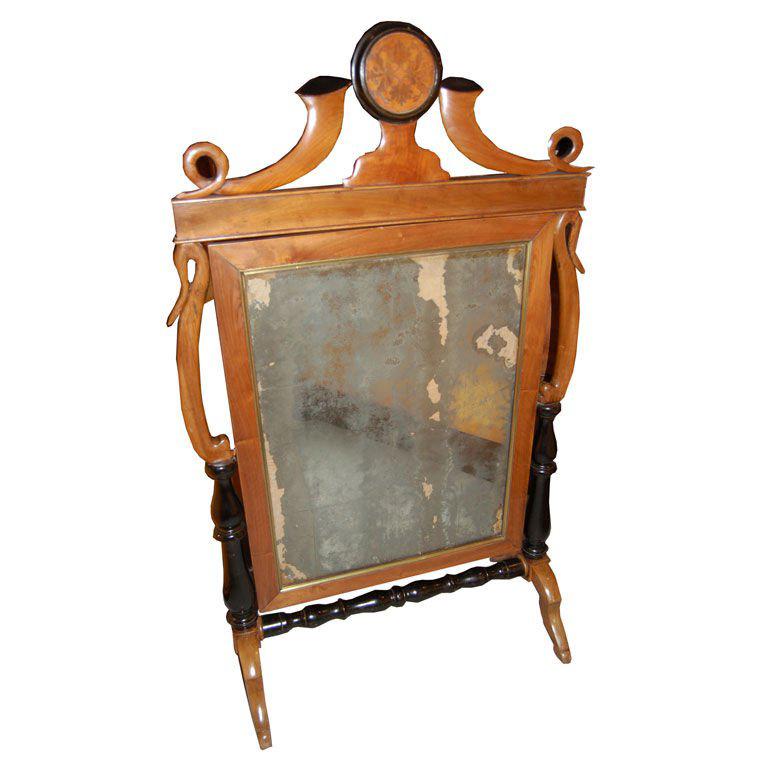 German Cheval standing mirror made of walnut with ebonized wood.