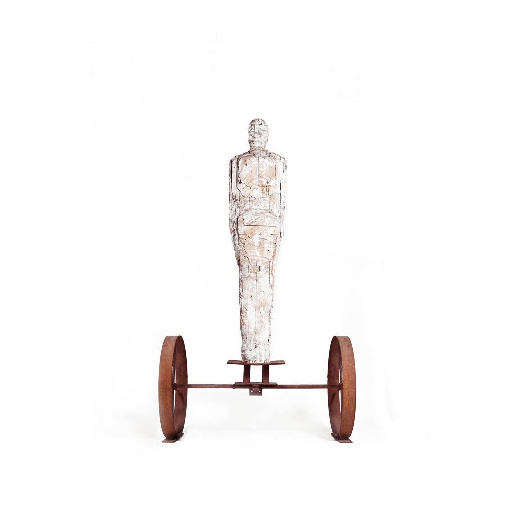 Large Standalone Male Figure Wood Carved on Rusted Iron Wheels Stand - Brown Nude Sculpture by German Consetti
