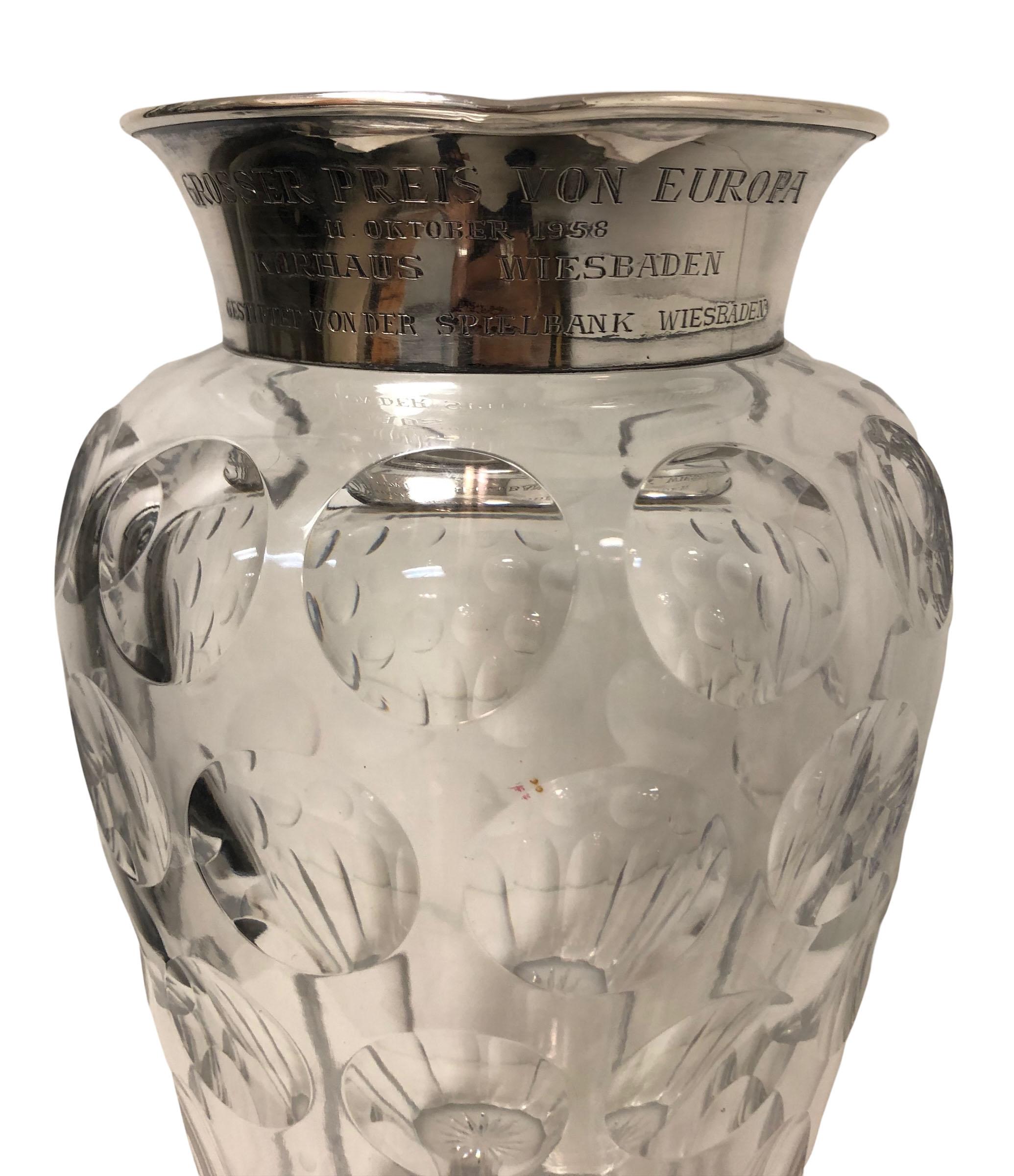 A German crystal presentation piece with a sterling silver monogrammed top. The high-quality crystal has three rows of large polkadots a whimsical and attractive design. Monogram is in German but does not look like German glass it looks rich and it