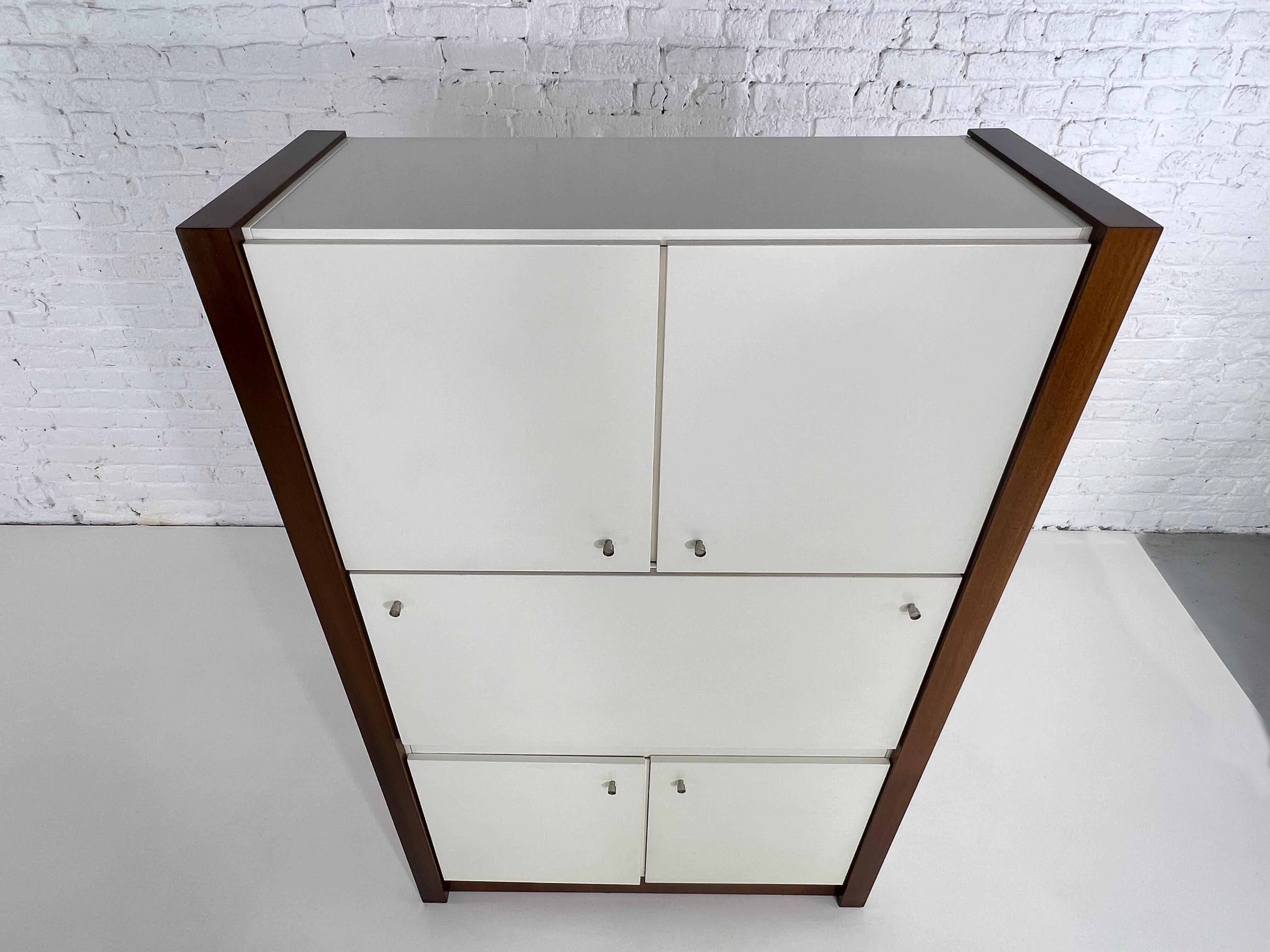 Minimalist And German Design buffet, timeless lines, robustness and high quality : can be used as a dry bar or storage cabinet and hidden secretary too!
 