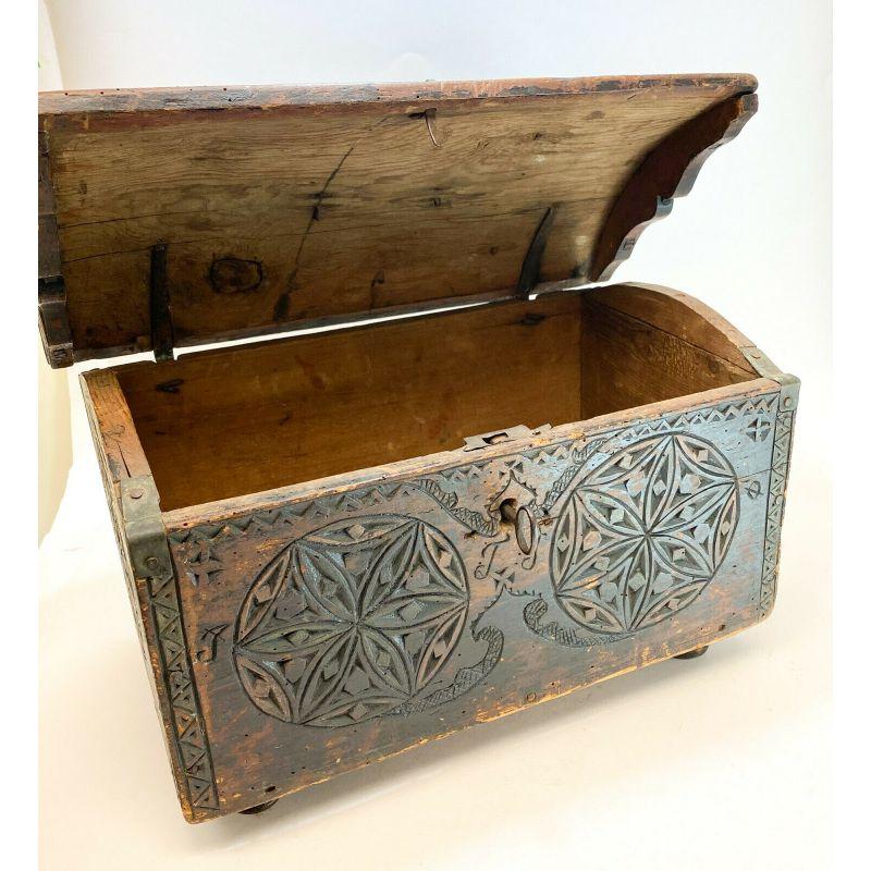 German - Dutch Hand Carved Wood Chest Box or Trunk w. Iron Mounts, 18th Century 

18th century German - Dutch hand carved wood chest box or trunk with iron mounts Hand carved floral designs throughout the exterior and lid. Iron hardware including
