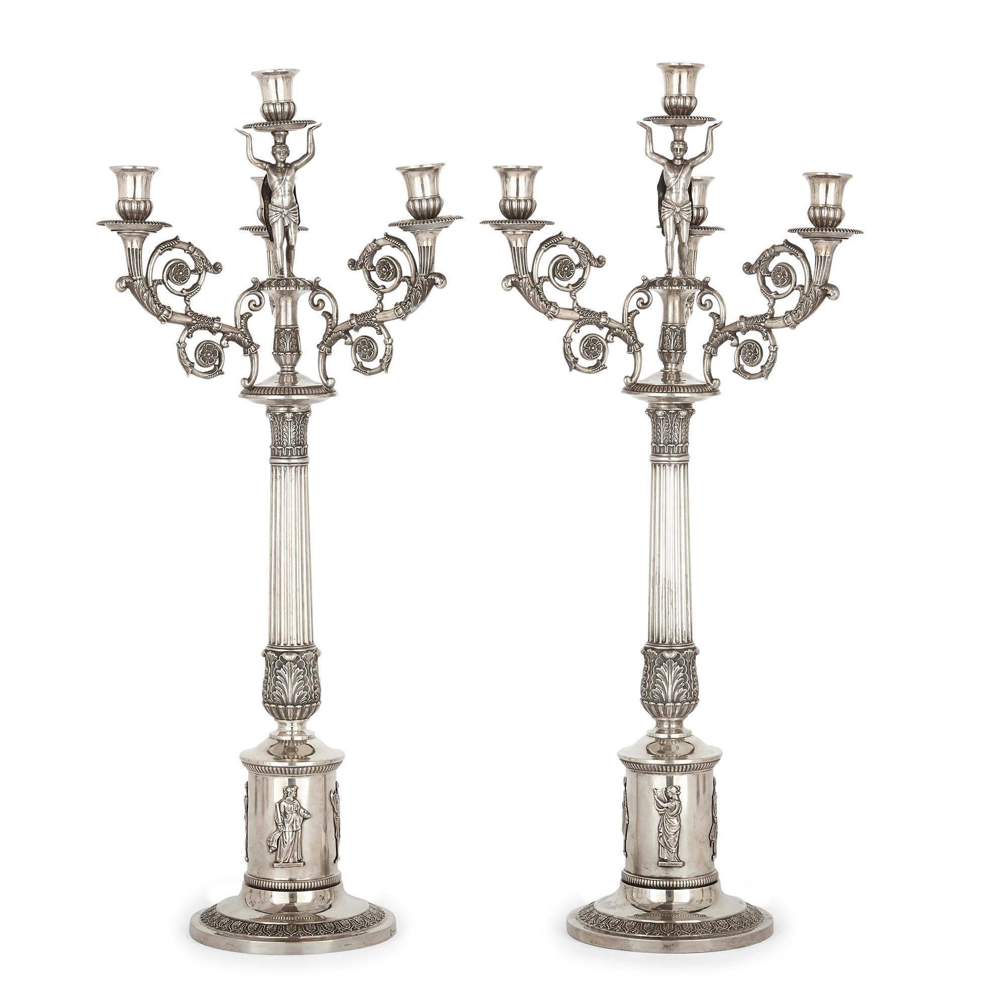 German empire period seven-piece silver candelabra set
German, circa 1810
Meaures: Largest: Height 66.5cm, diameter 30cm
Smallest: Height 51cm, width 28cm, depth 14cm

This composite garniture is the combination of one single candelabrum and