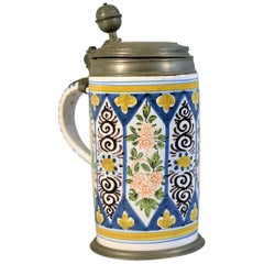 Deutscher Fayence:: zinnglasierter Steingutkrug mit Blumenbändern:: um 1760