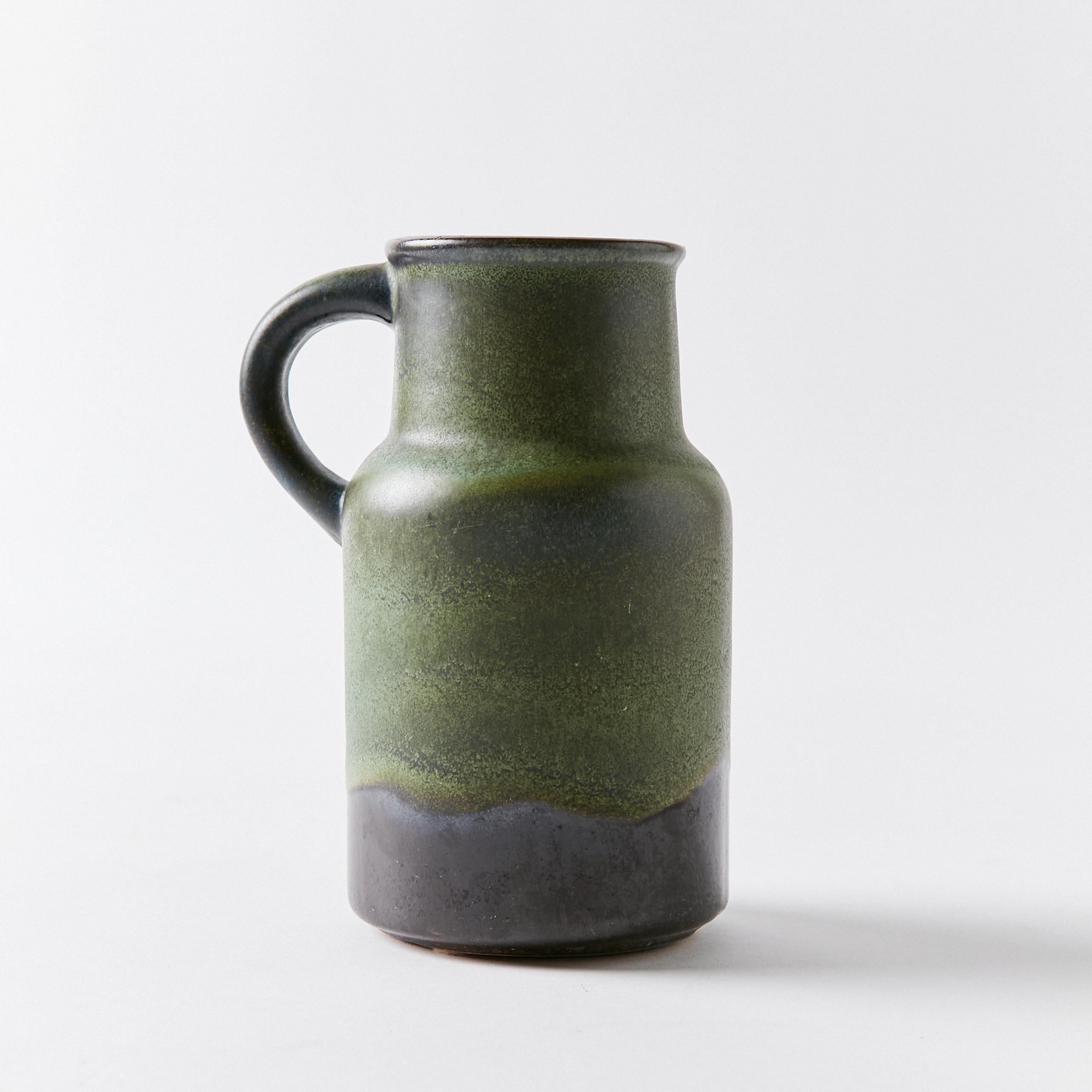 Fat lava vase in dry green tones by Scheurich Keramik. Signature stamp on bottom.