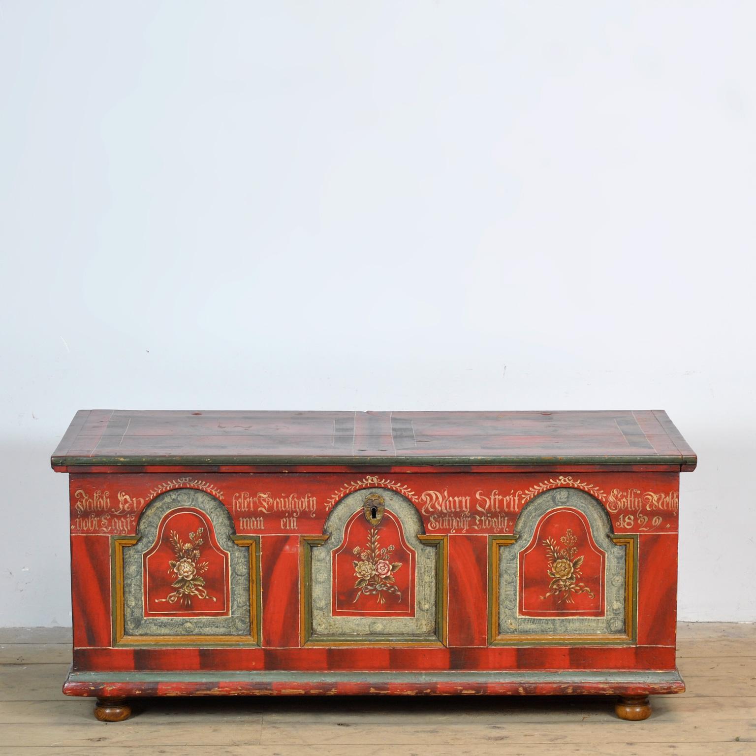 German bridal chest made in 1829. Hand-painted with beautiful fine details. The iron hinges are hand-forged. The chest is made of pine. There is a compartment on the inside for valuables.