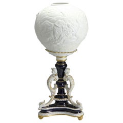 German Footed Porcelain Lamp, White Bisque Shade w/ Putti, Figures, 20th Century