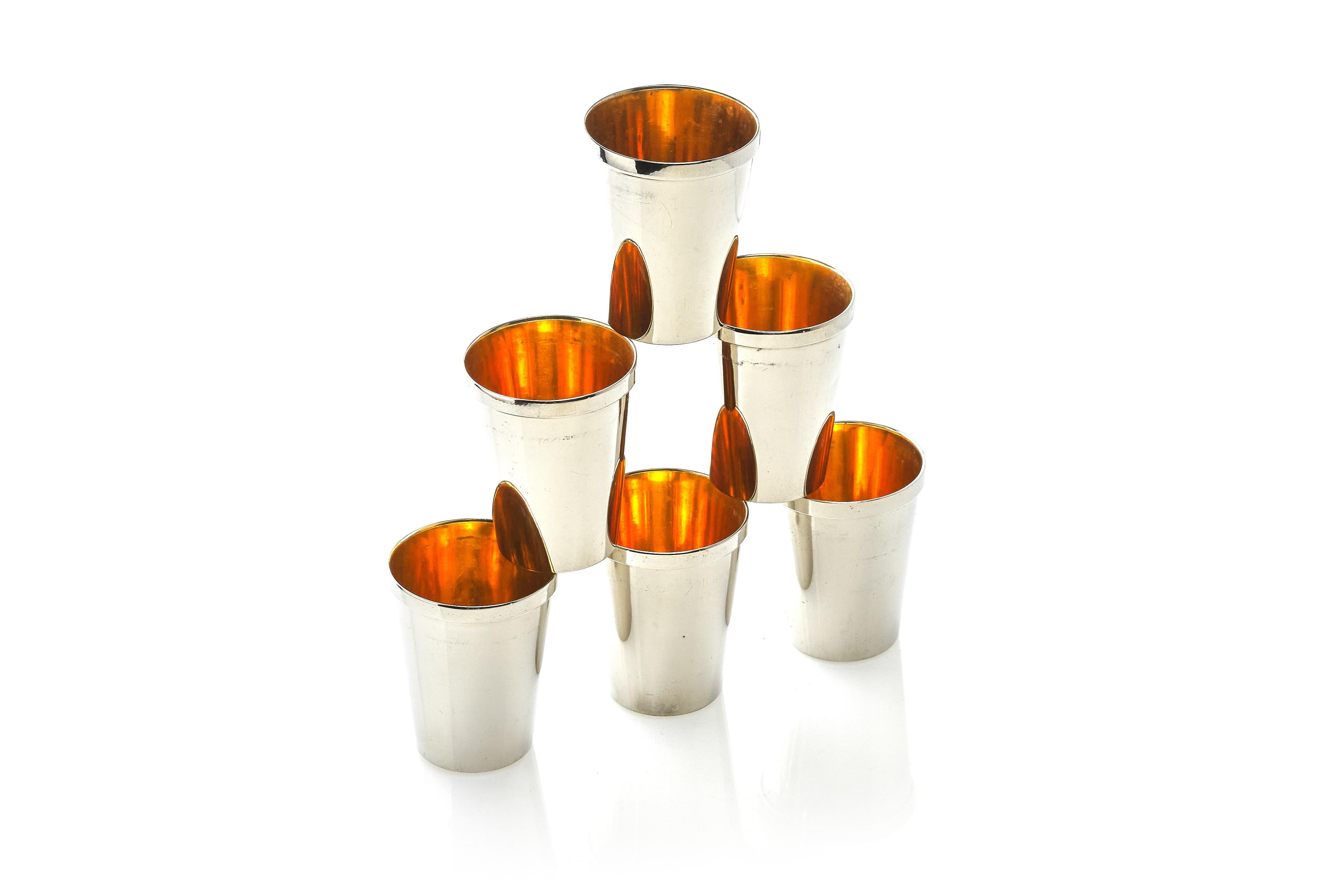 A fine set of 6 gilt-silver shot glasses.

Marked, made in Germany on bottom,

1950s.
