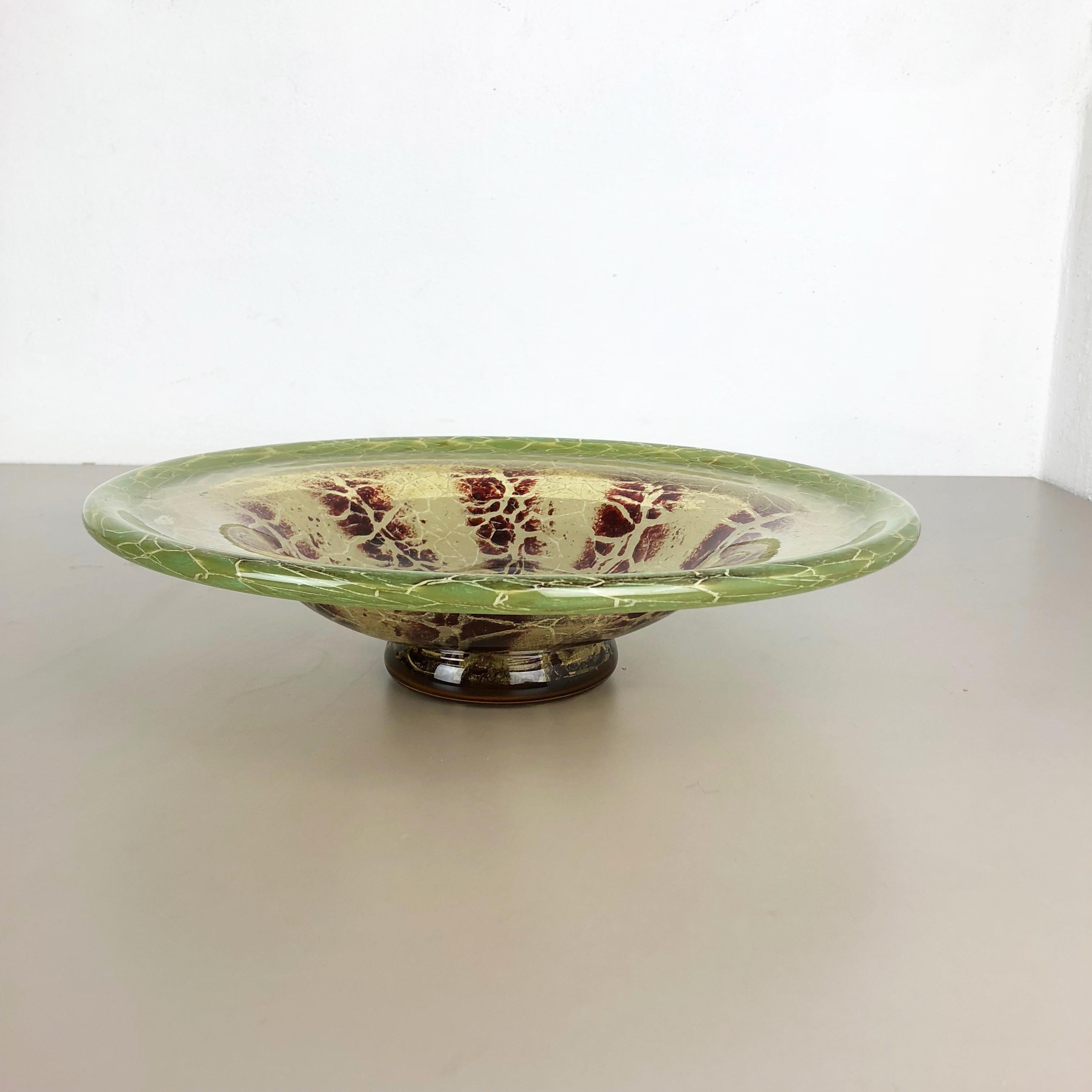 Article: Glass bowl



Producer: WMF, Germany 



Designer: Karl Wiedmann 


Age: 1930s



Description: 

Wonderful heavy Art Deco glass element designed by Karl Wiedmann and produced WMF, Germany in the 1930s. This glass bowl is