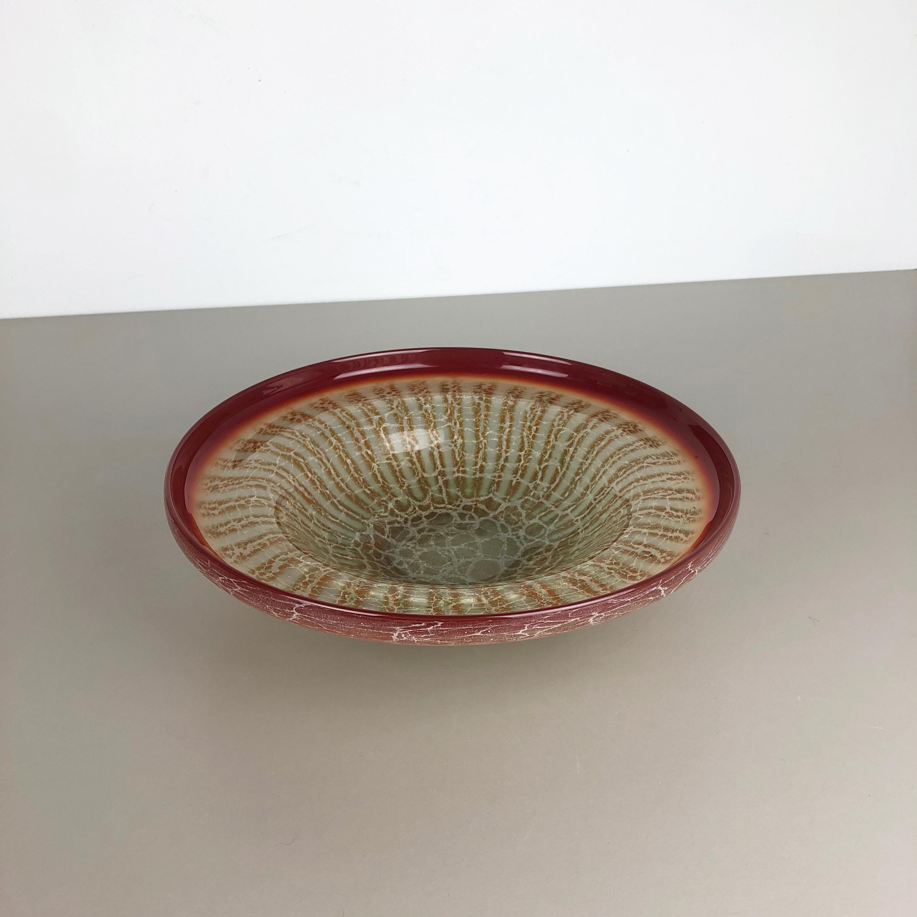 Article: Glass bowl



Producer: WMF, Germany 



Designer: Karl Wiedmann 


Age: 1930s



Description: 

Wonderful heavy art deco glass element designed by Karl Wiedmann and produced WMF, Germany in the 1930s. This glass bowl is