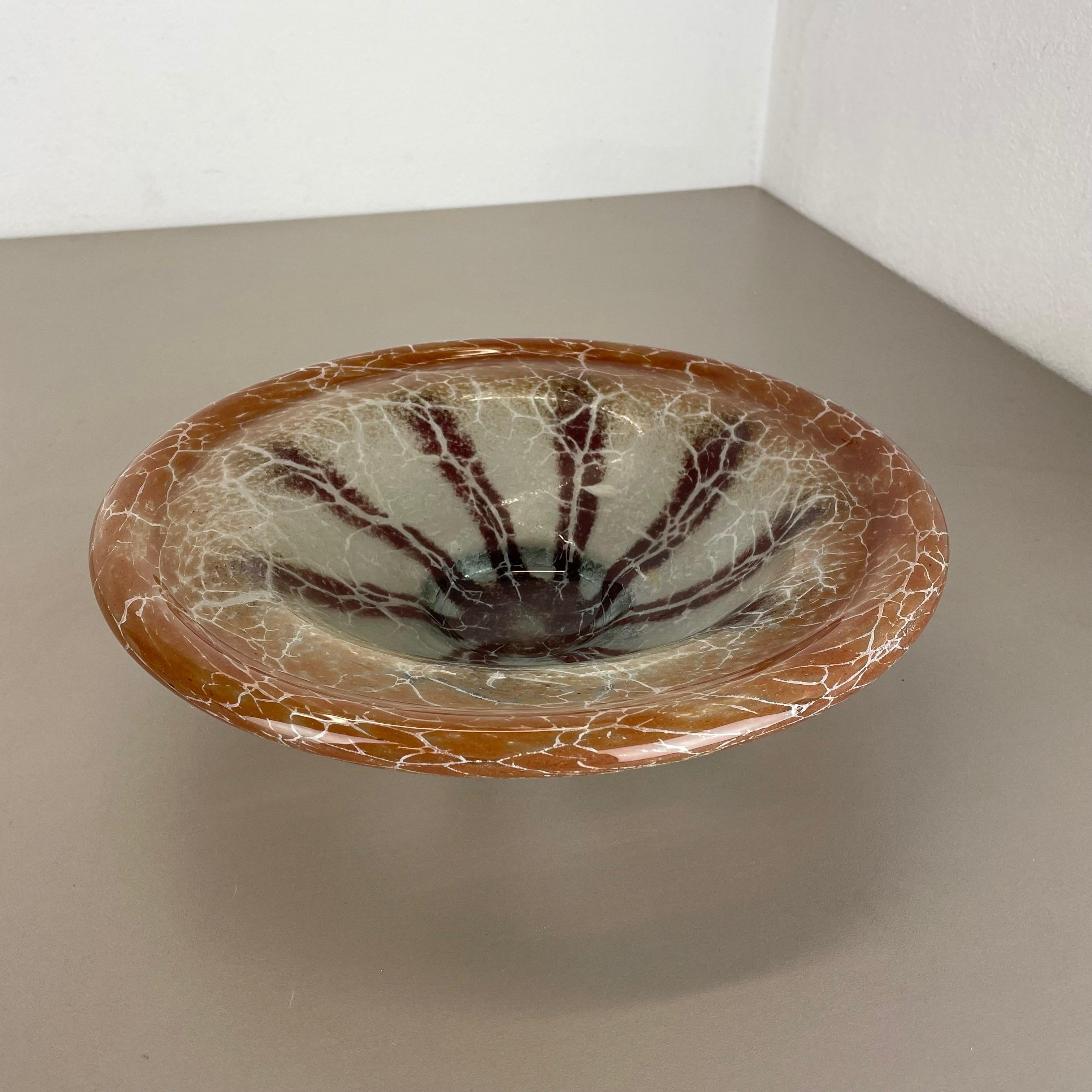 Article: Glass bowl



Producer: WMF, Germany 



Designer: Karl Wiedmann 


Age: 1930s



Description: 

Wonderful heavy Art Deco glass element designed by Karl Wiedmann and produced WMF, Germany in the 1930s. This glass bowl is