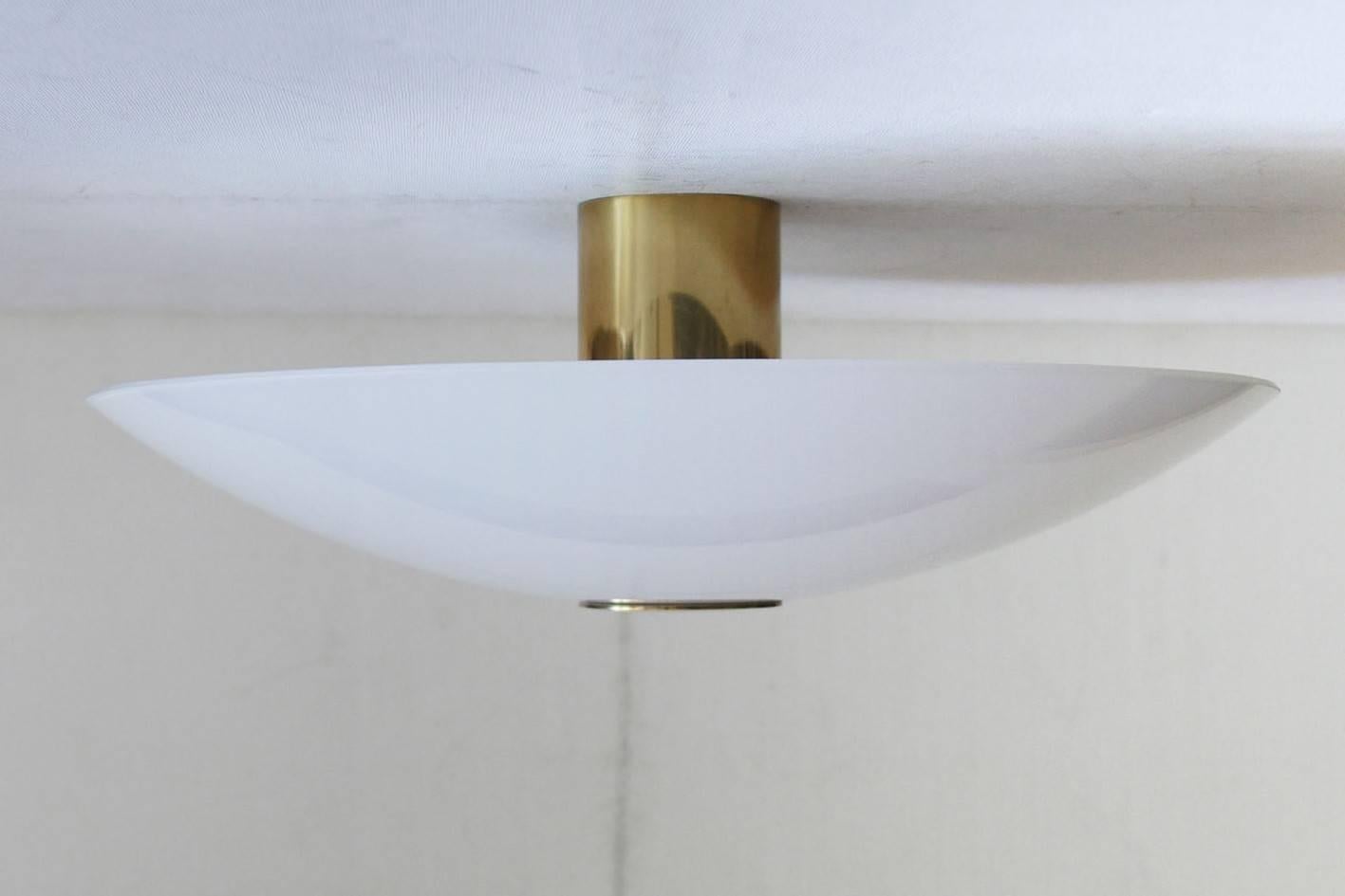 White-opal glass and brass wall or ceiling flush mounts, Germany

Lamp sockets: Five x E27 (US E26).