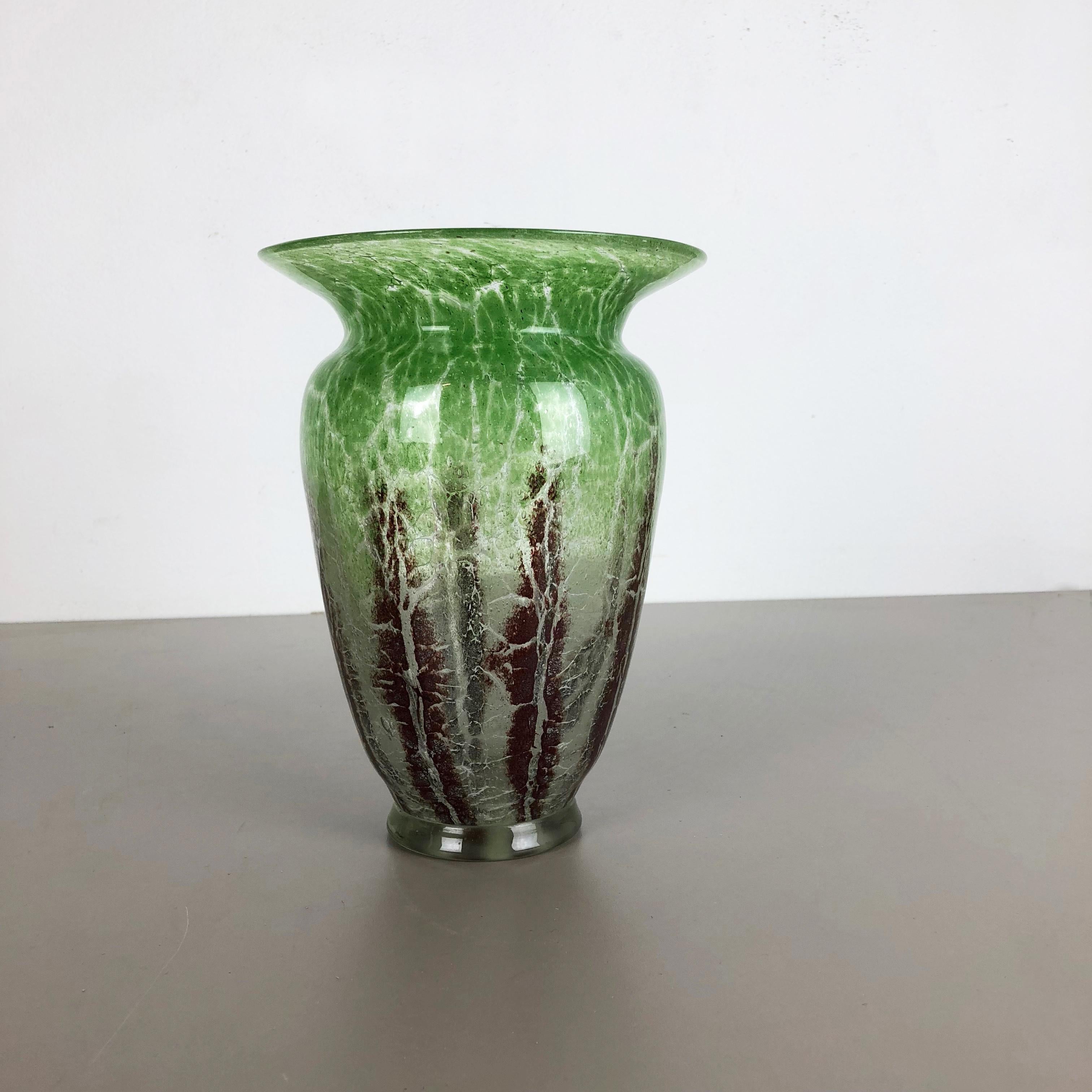 Article: Glass vase



Producer: WMF, Germany 



Designer: Karl Wiedmann 


Age: 1930s



Description: 

Wonderful heavy Art Deco glass element designed by Karl Wiedmann and produced WMF, Germany in the 1930s. This glass bowl is