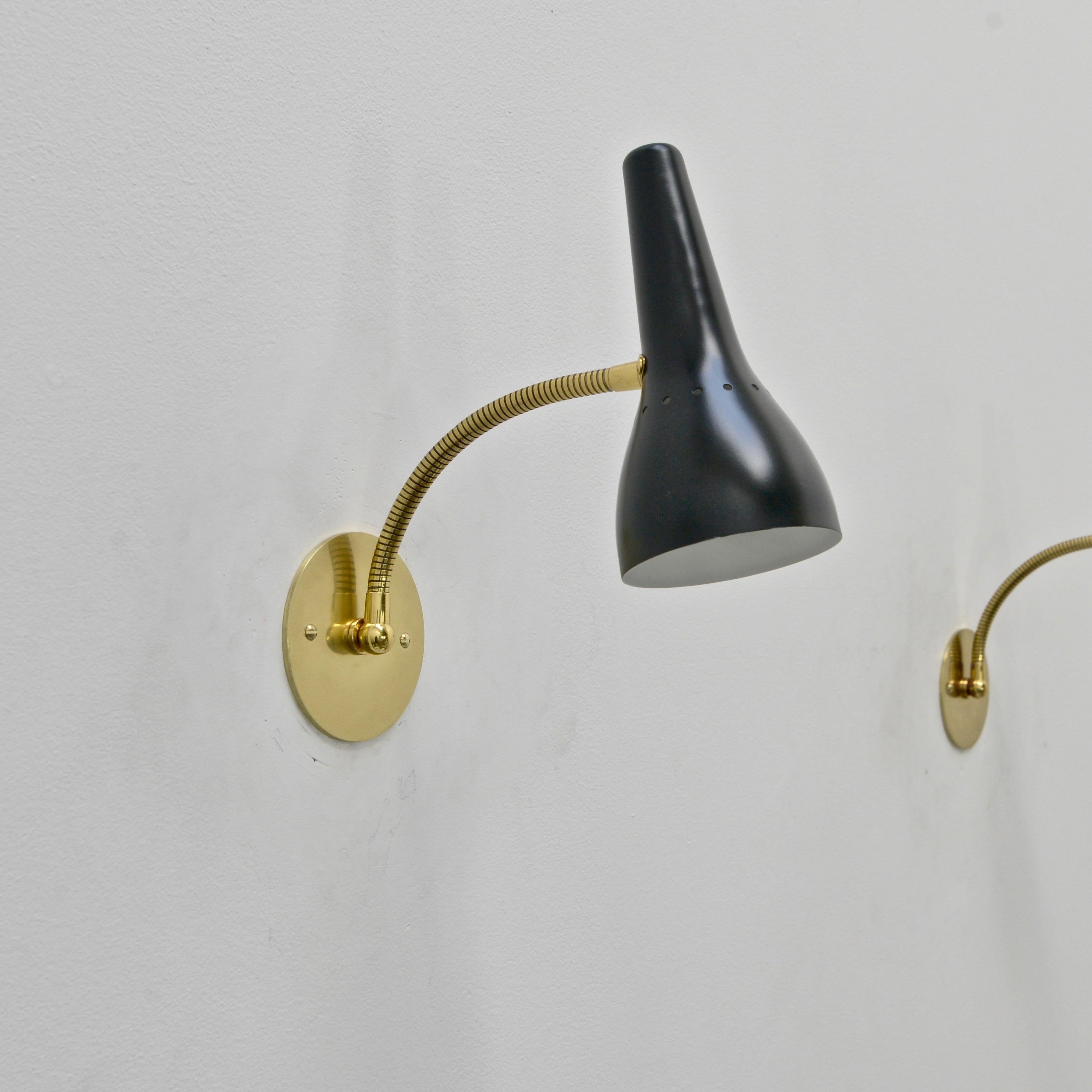 Pair of vintage German gooseneck reading sconces from the 1950s partially restored in painted aluminum and brass. Single E12 candelabra based socket per sconce. Priced as a pair. Wired for use in the US. Lightbulbs included with