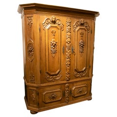 Used German Hand Carved Wooden Cupboard with Fruit and Angel Scenes