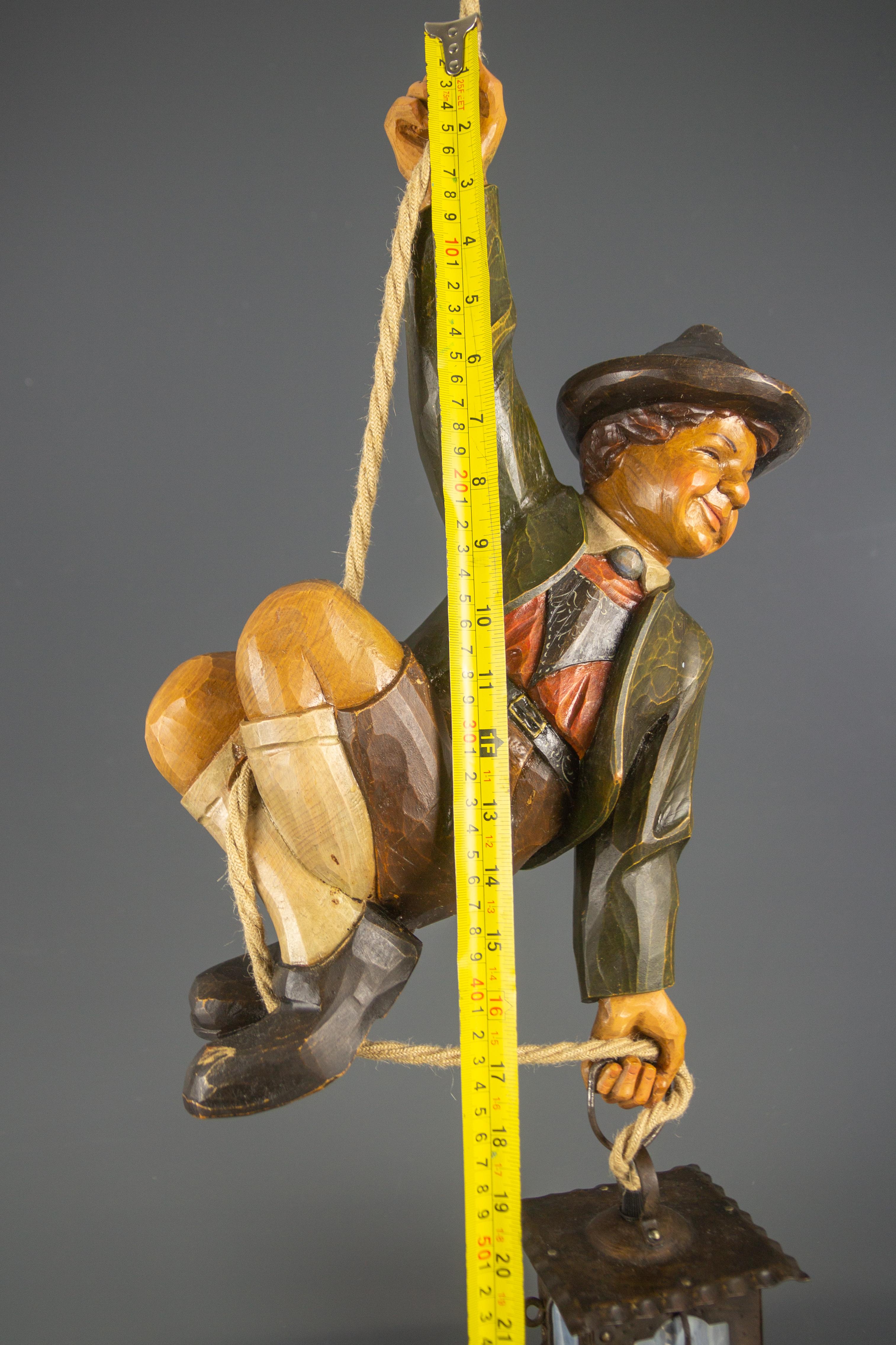 German Hanging Lamp with Hand Carved Sculpture of Mountain Climber and a Lantern 7