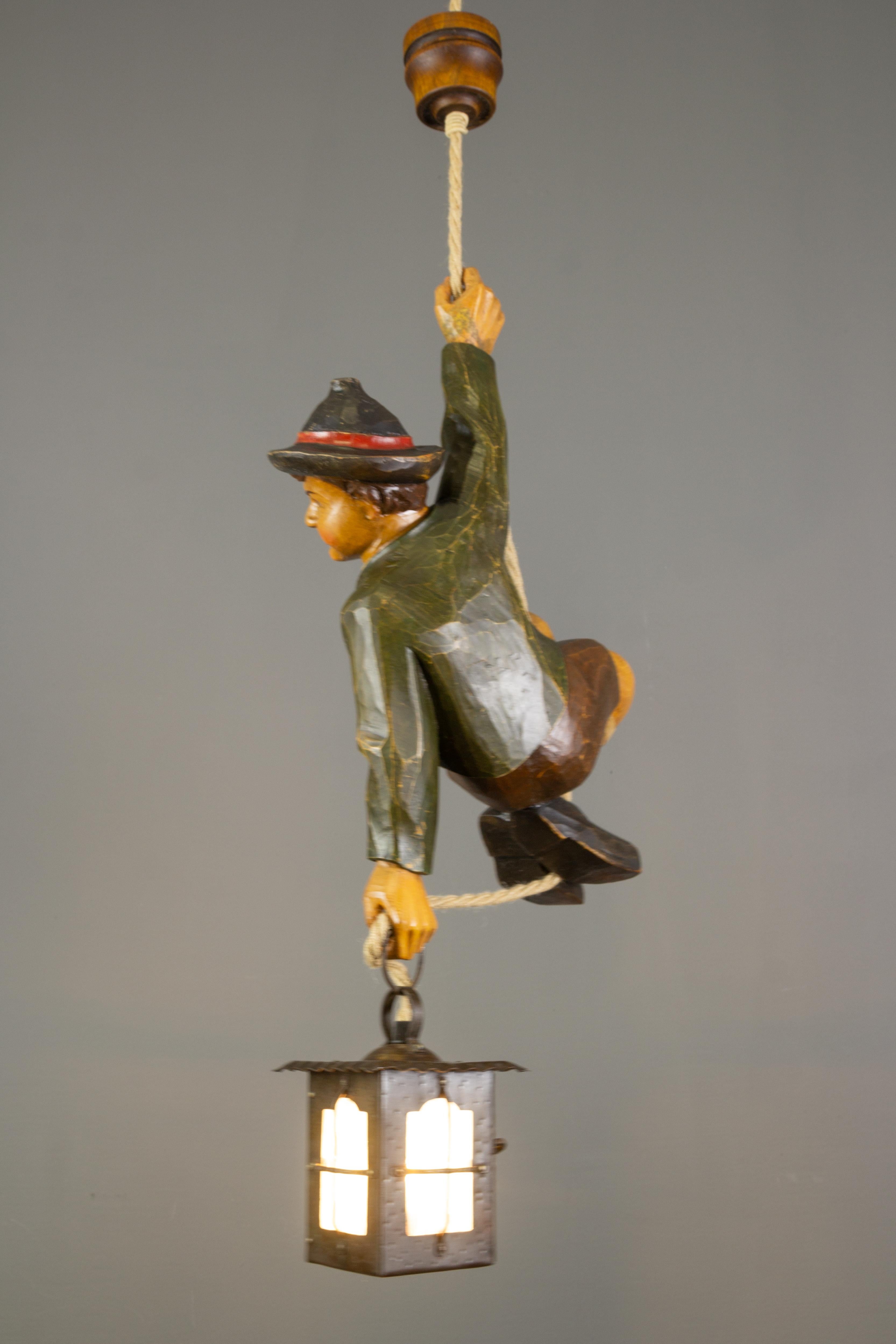 German Hanging Lamp with Hand Carved Sculpture of Mountain Climber and a Lantern In Good Condition In Barntrup, DE