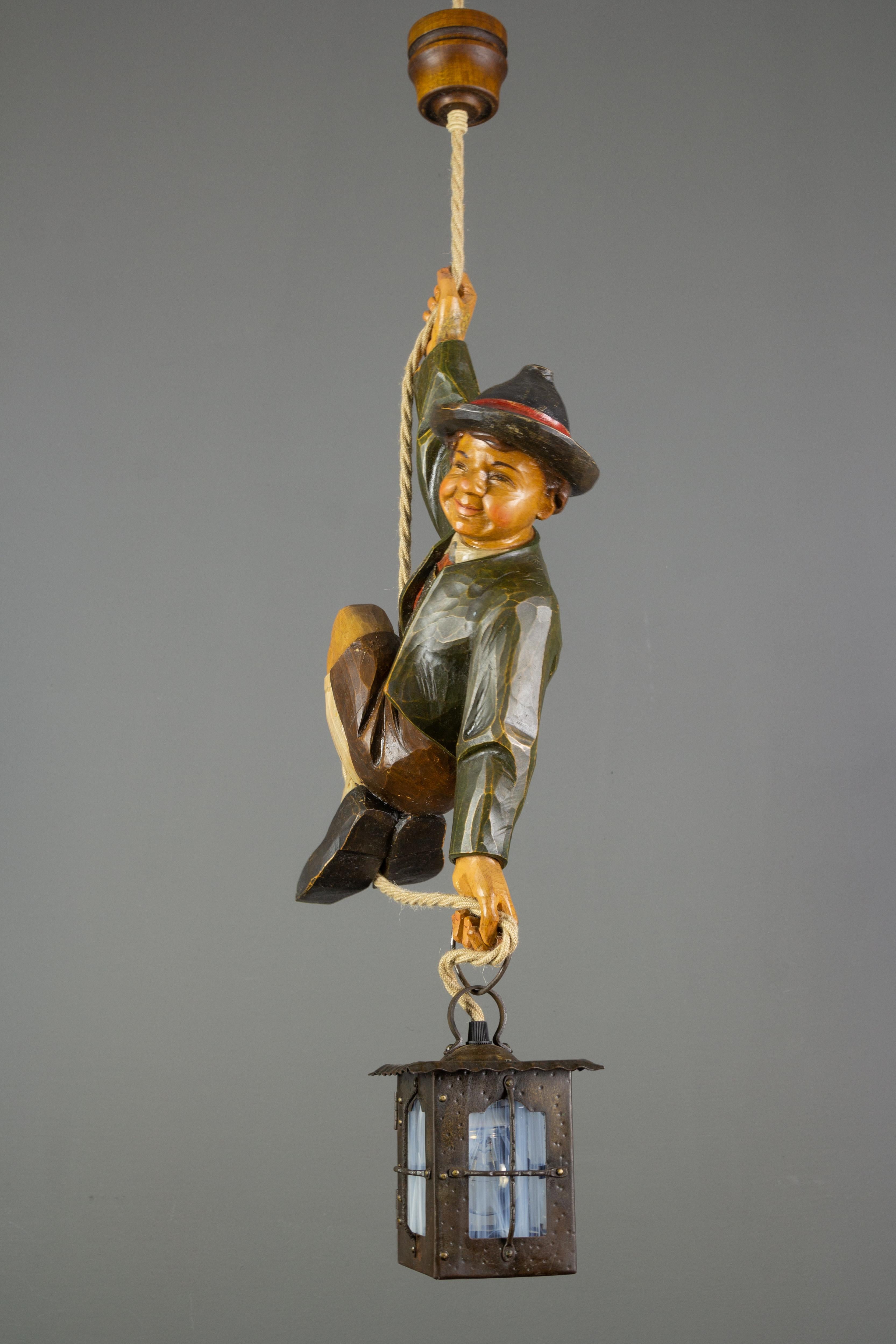 Mid-20th Century German Hanging Lamp with Hand Carved Sculpture of Mountain Climber and a Lantern