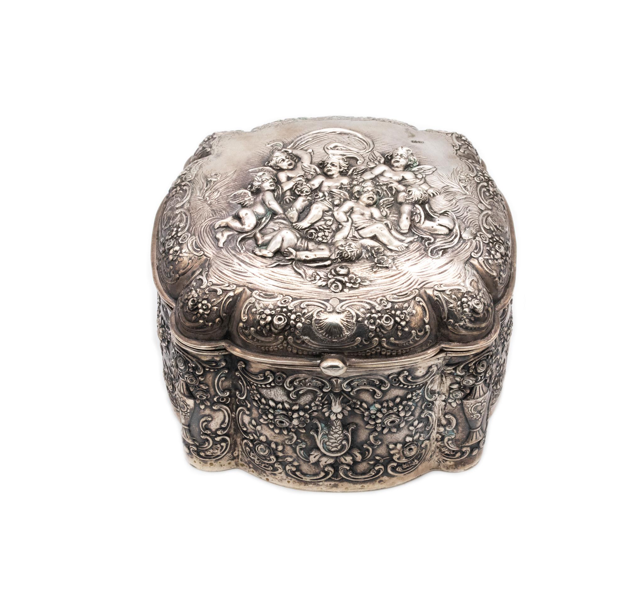 Gorgeous German box in sterling silver.

An impressive highly decorated north European piece, made in Germany during the Imperial period, circa 1890-1910. It was totally crafted in repousse of solid .800/.999 sterling silver, with the interiors
