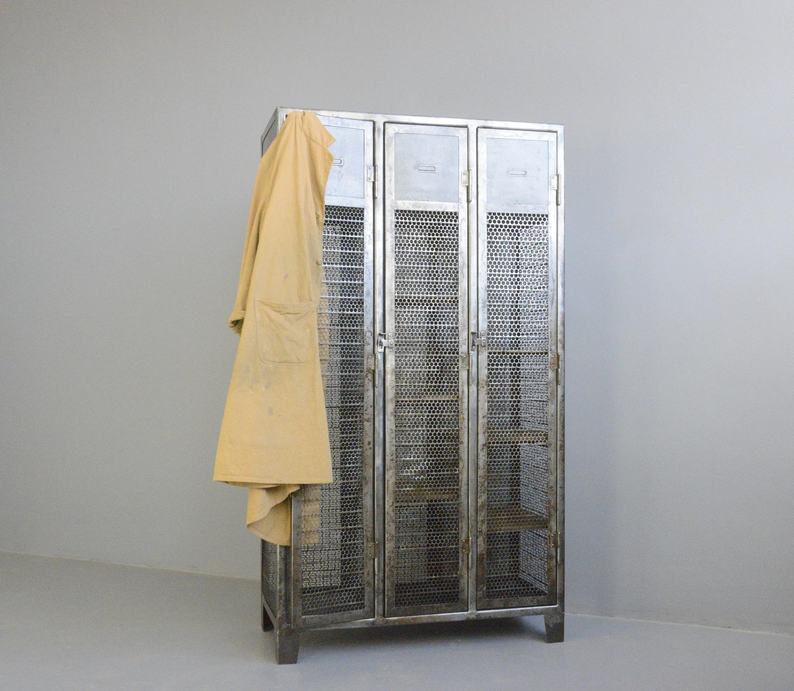 - Pressed steel mesh doors
- Original label holders
- Hanging space and shelves
- German ~ 1930s
- 100cm wide x 45cm deep x 180cm tall

Condition report

The lockers have been cleaned and clear lacquered on the outside and sprayed black on