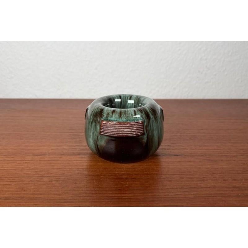 German Jugendstil Art Nouveau Studio Pottery Candleholder by Theodor Keerl, 1920s, in Very Good conditions. Designed 1890 to 1919 This piece has an attribution mark,
Official proof of authenticity such as vintage catalogs, designer records or other