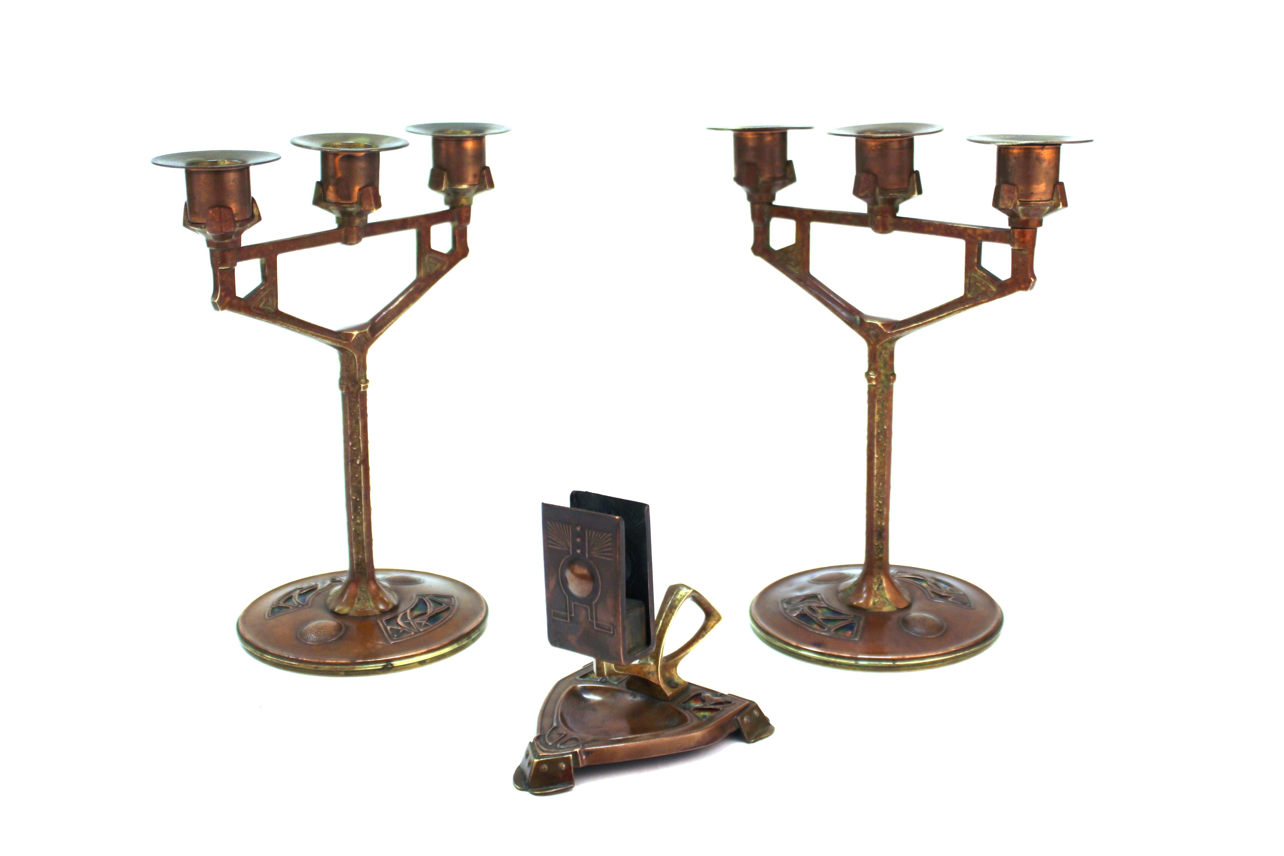 German Jugendstil period pair of three-armed candelabra with match-safe, created in Germany around 1900. The set is made of bronze, copper, brass and enamel and has a desirable age-appropriate patina.