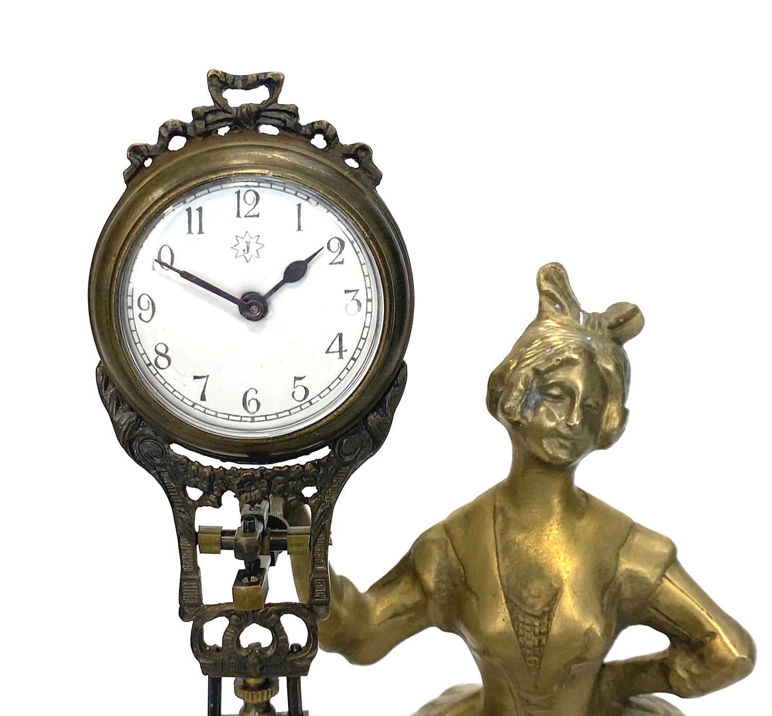 20th Century German Junghans Style Brass Barmaid Lady Swinging Clock For Sale