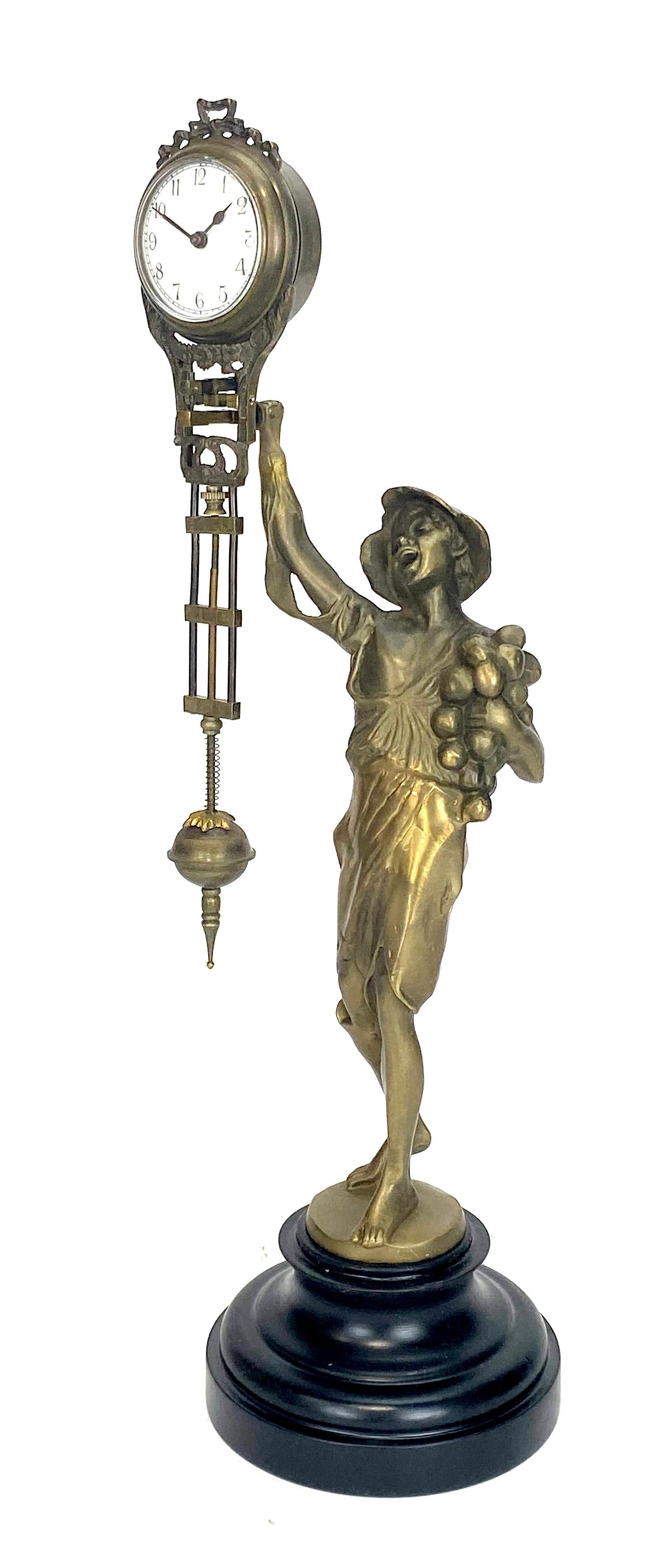 German Style Brass Onion Boy Figure Swinging Clock

Solid Brass cast statue with polished wood base. Hand painted 2