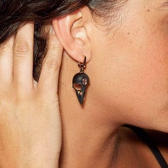 Pendientes de Plata Alemana Kabirski Calvina Motivo Calavera Asimétrica Amatista Natural