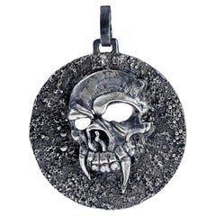 German Kabirski Helm Oxidized 925 Silver Skull Pendant on Dark Textured Surface