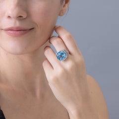 German Kabirski Lyric Rhodium Plated Silver Ring with Round-Cut Blue Topaz