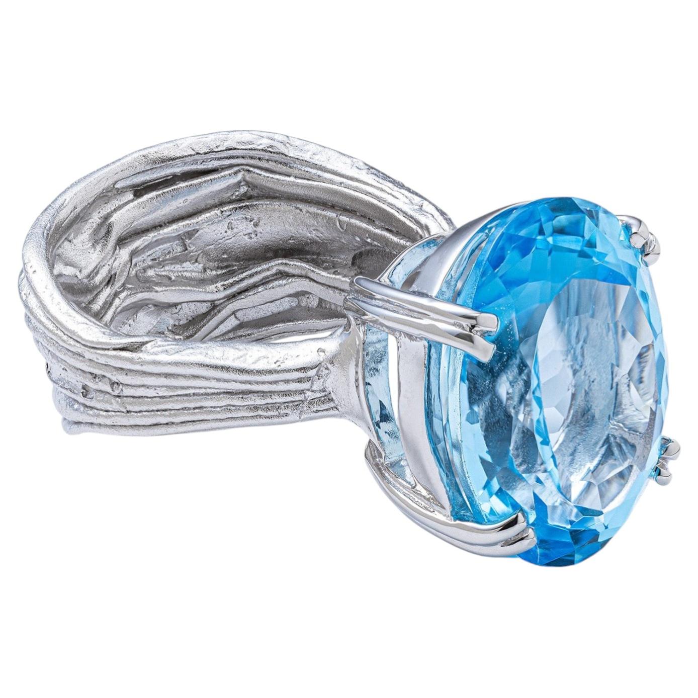 German Kabirski Nila Textured Silver Ring with Natural Oval-Cut Blue Topaz