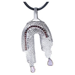 German Kabirski Nuada Singular Edition Pink Sapphires & Garnet Silver Pendant German Kabirski Nuada Singular Edition Pink Sapphires & Garnet Silver Pendant