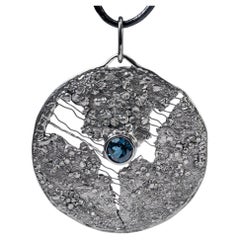 Ciondolo a rete in argento e titanio German Kabirski Rhiannon Singular Edition Topaz