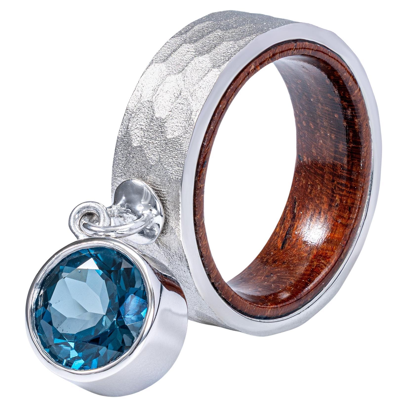 German Kabirski Undine Suspended Blue Topaz Silver 
Rosewood Ring en vente