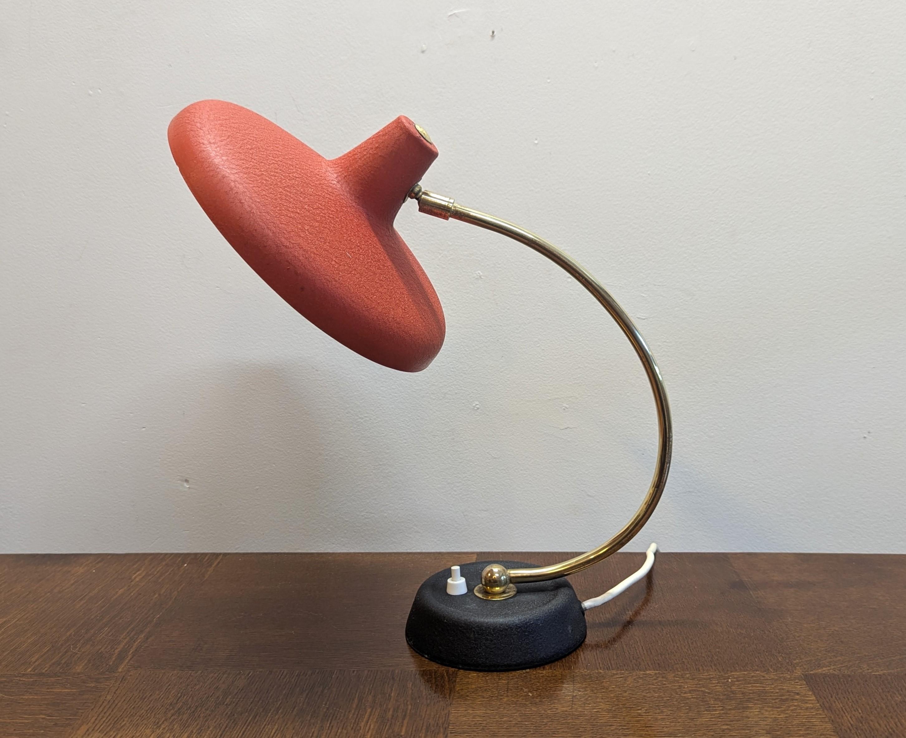 German Mid Century Modern Articulating Desk lamp.  
Aluminum shade articulating on brass arm.  Shade can move in any direction.  To our best research there have been few of this exact model lamp found.  Attributions have been Kaiser Leuchten, SIS